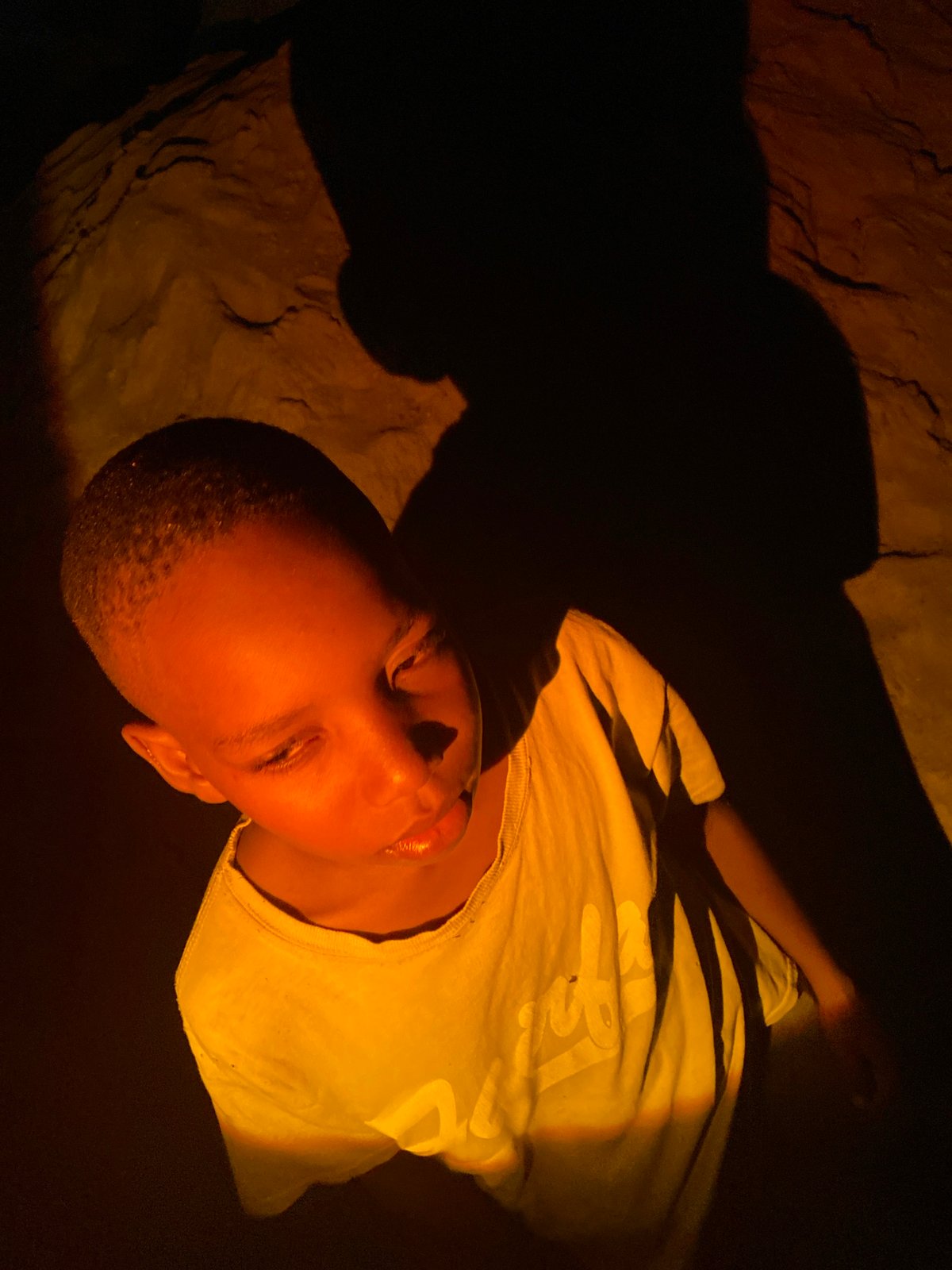 Evening portraits and soccer captured in Nigeria neighborhoods