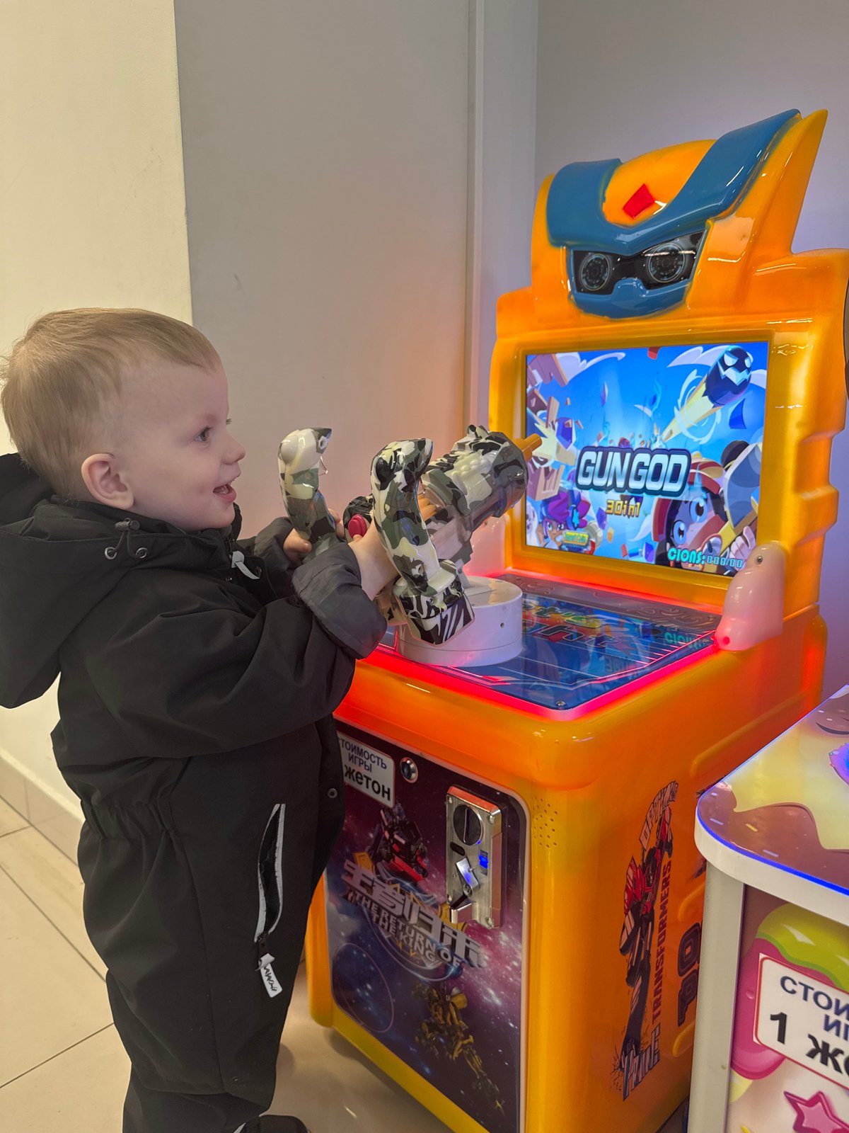 Family visits Saint Petersburg shopping center with toddler