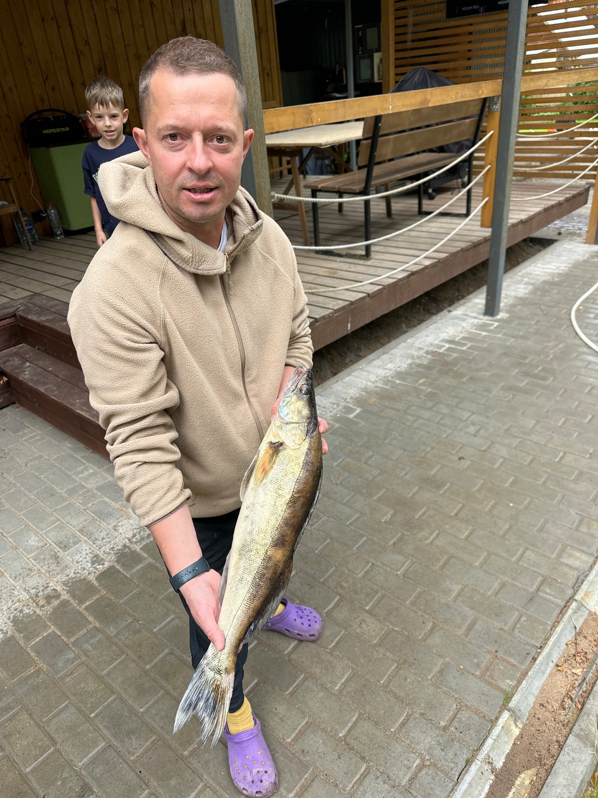 Backyard catch and a Maine Coon on the deck in Russia