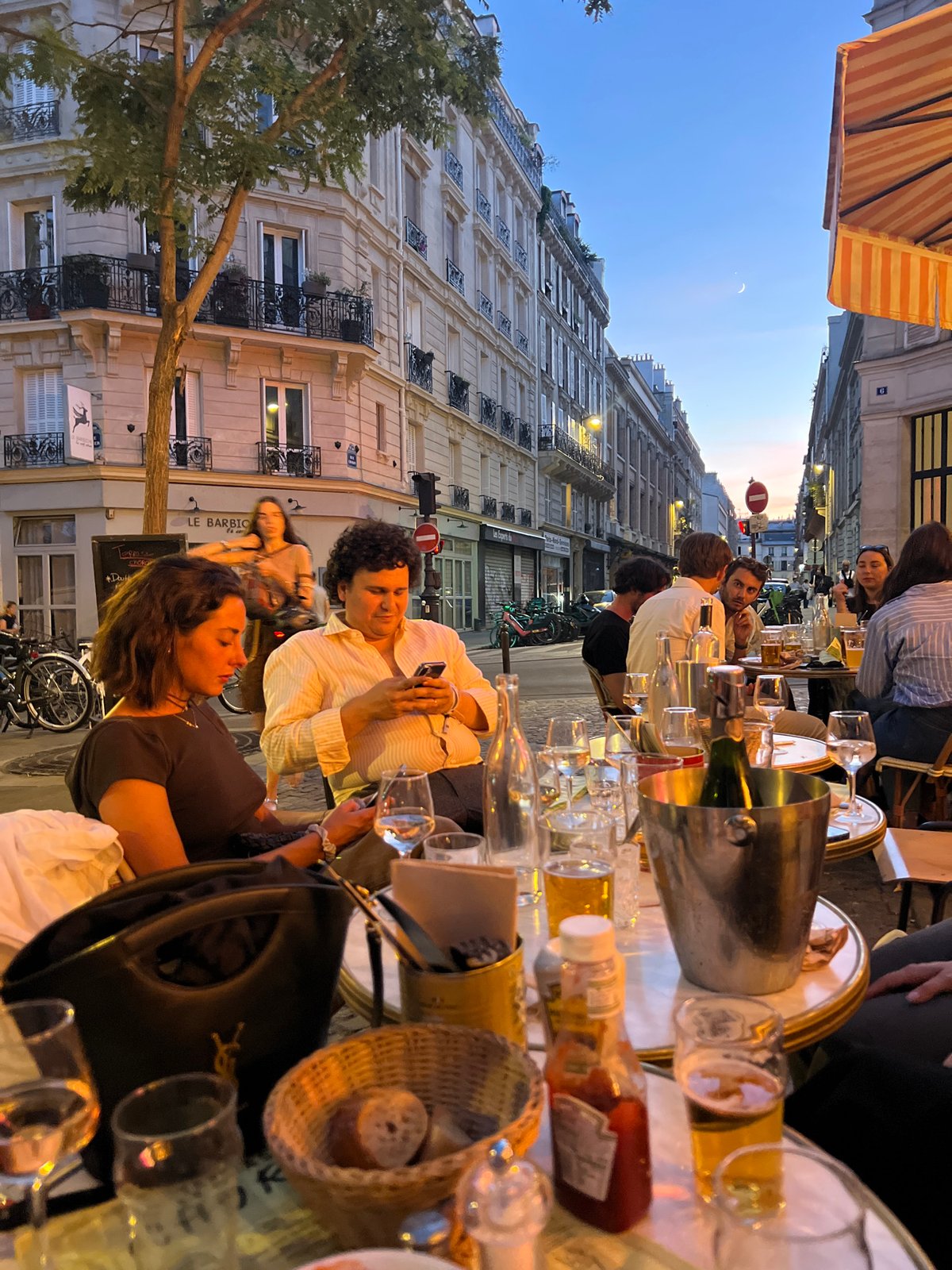 Twilight café evening on a classic Paris street