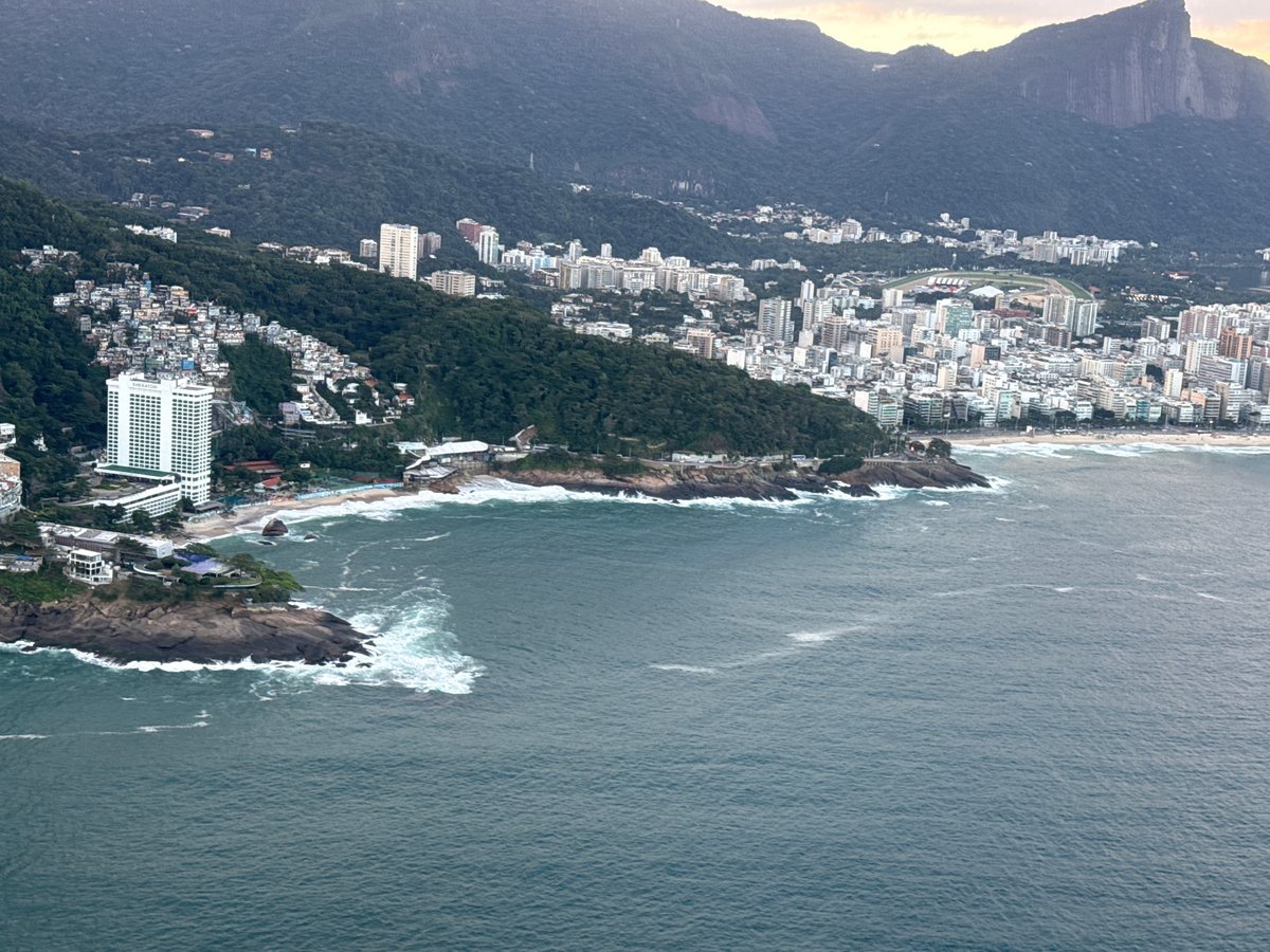 Aerial view captures Rio coastline and Vidigal favela