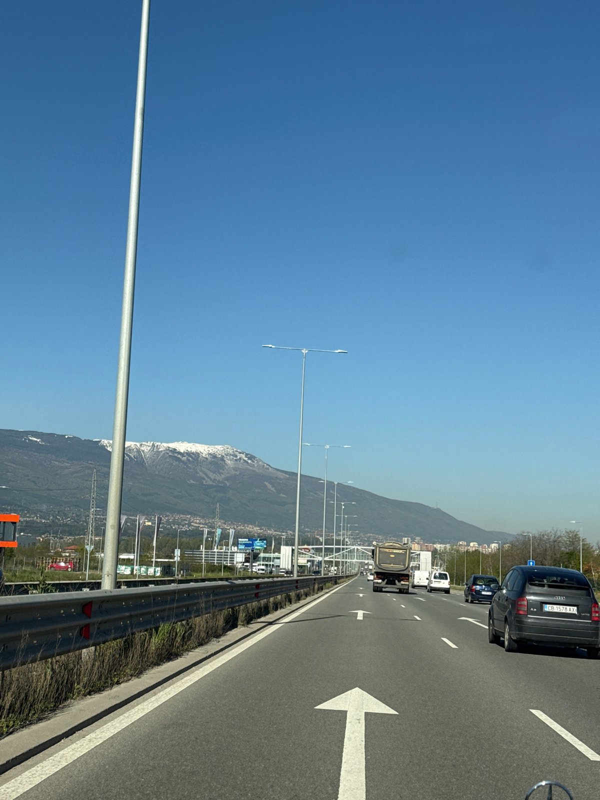Morning highway traffic documented near Sofia under clear skies