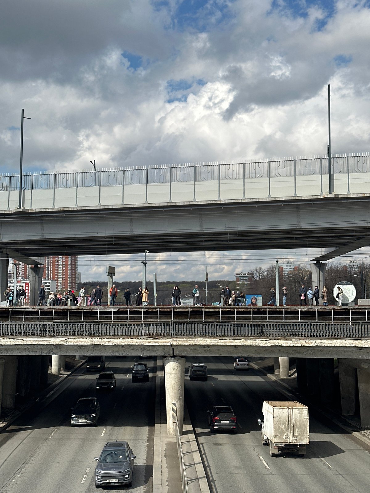 Urban scene documented from elevated viewpoint under cloudy skies