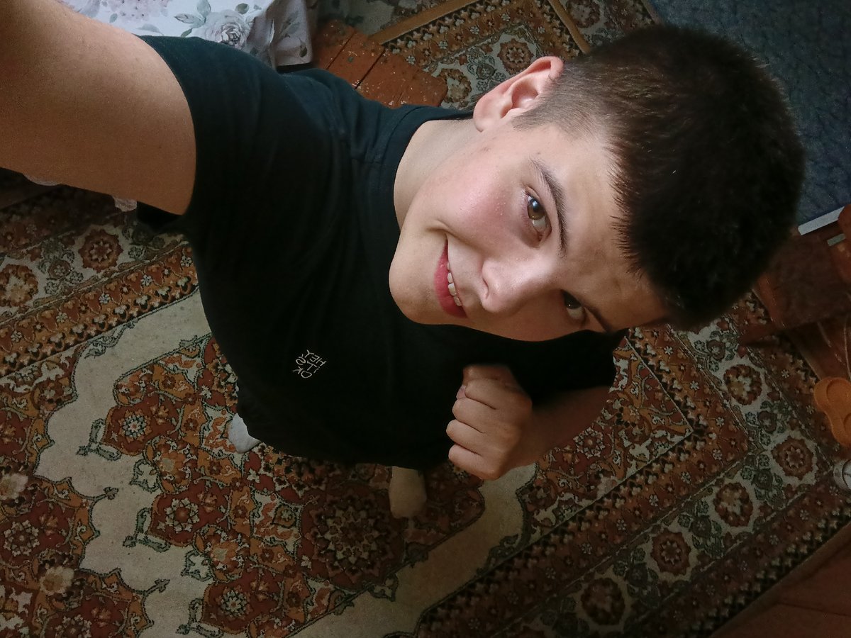 Young man's evening moments captured in Красный Маяк home