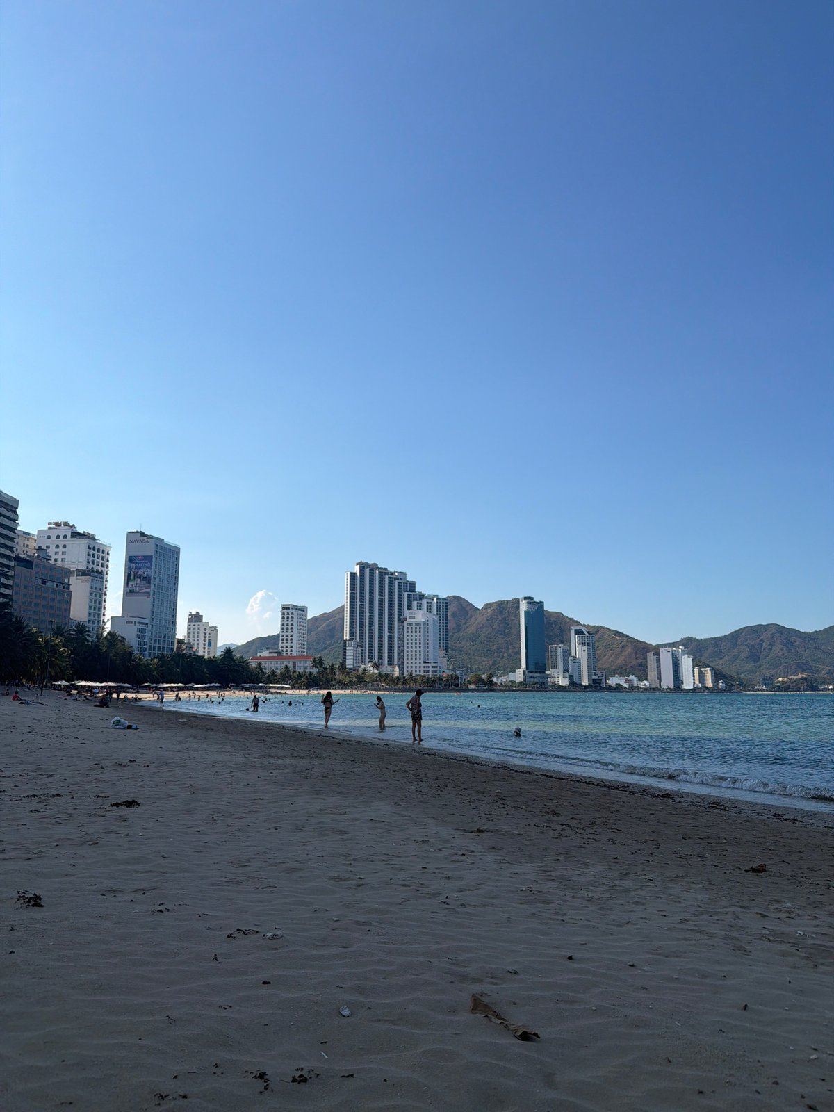 Beach soccer and swimming activity documented in Nha Trang