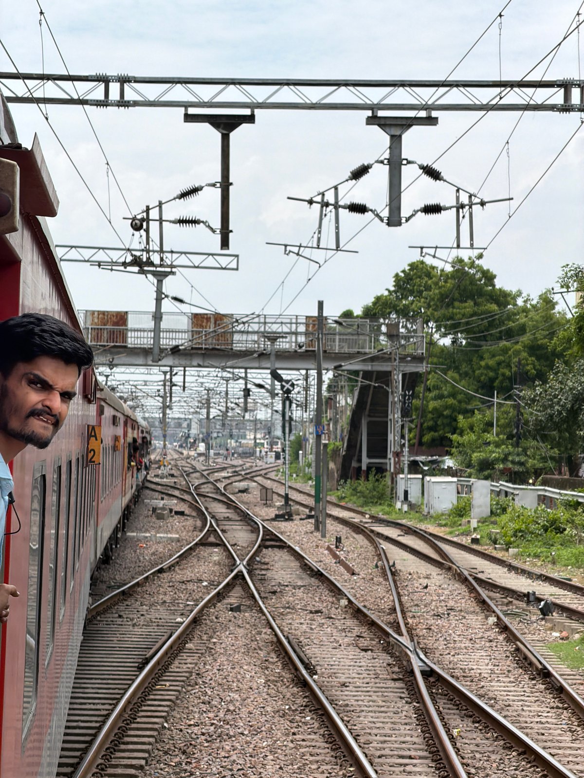Street-level snapshot of Kanpur's urban mix, morning rush