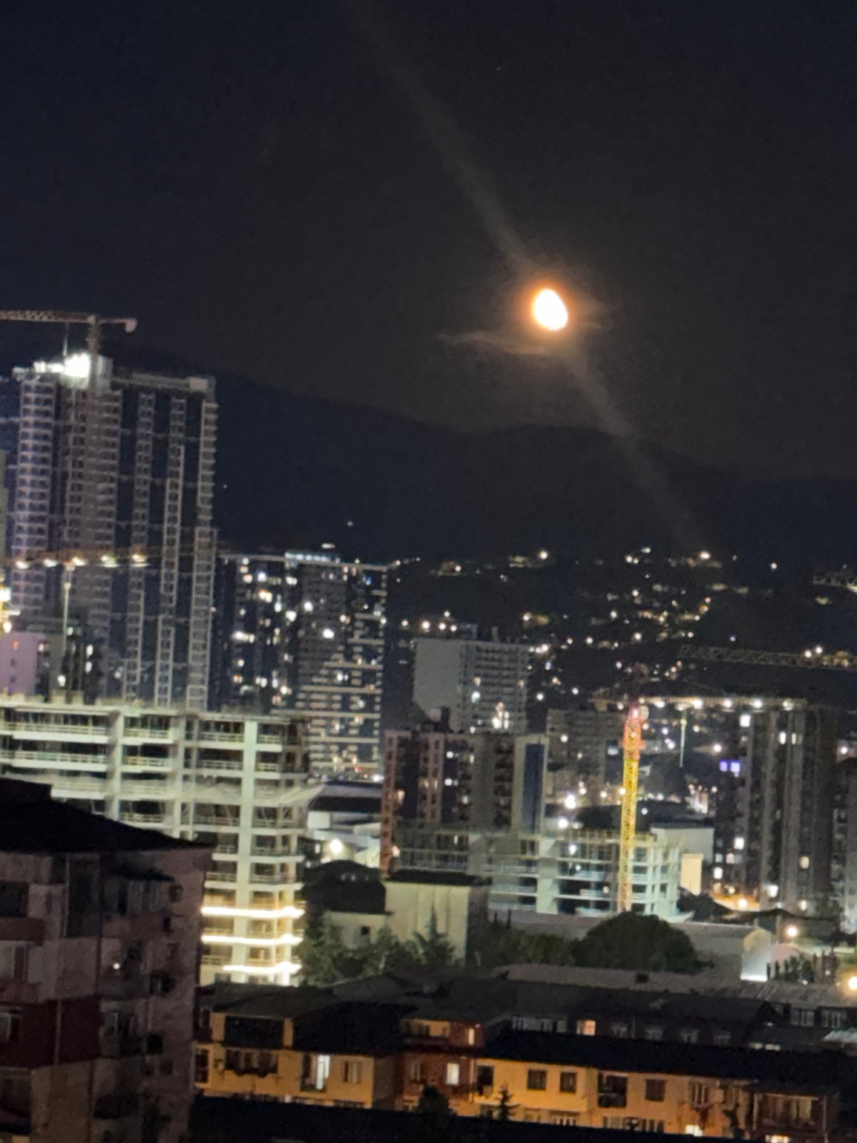 Nighttime urban views captured in illuminated Batumi, Georgia