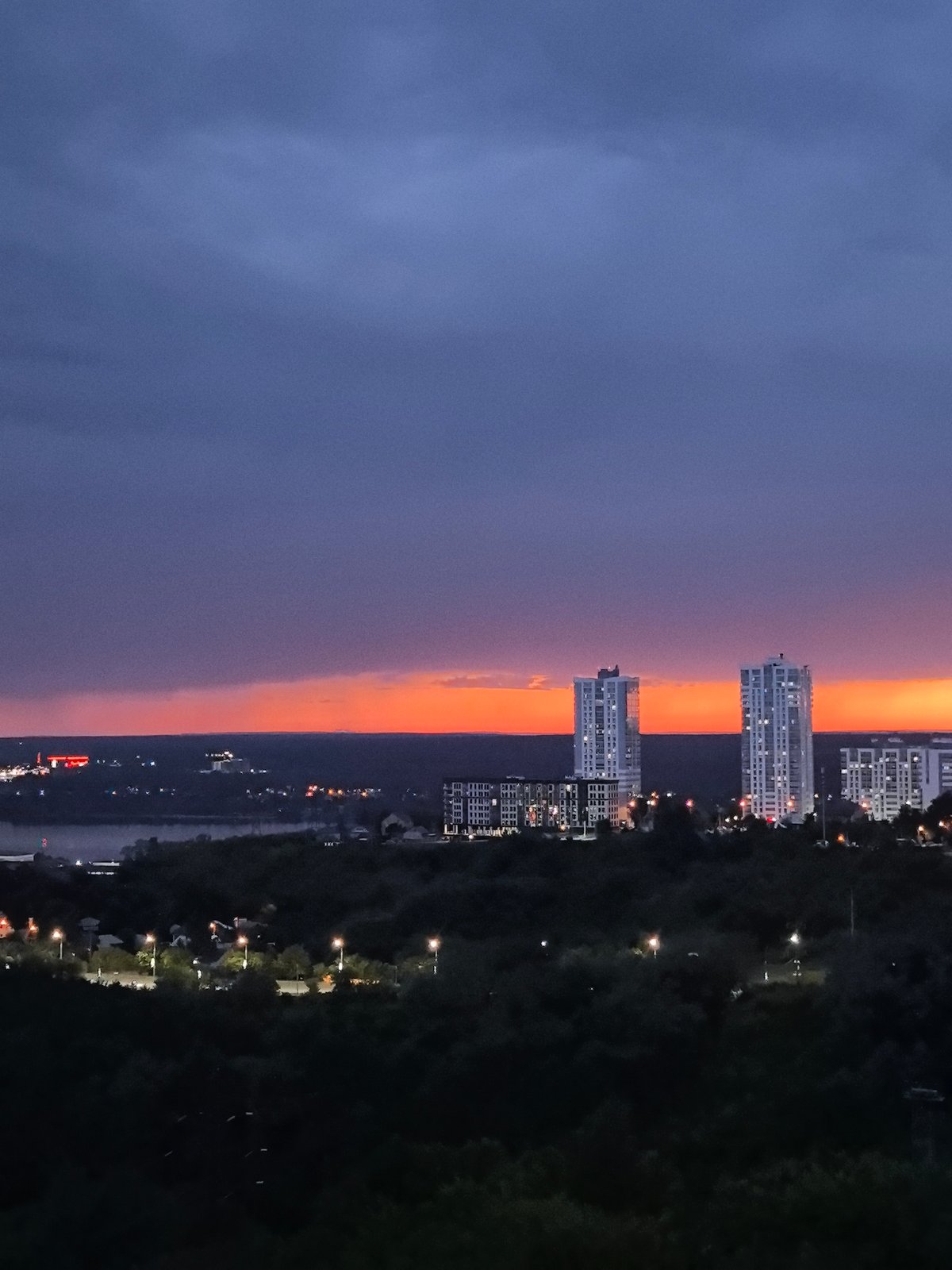 Perm Evening: Sunset Skies and Indoor Cat Moments