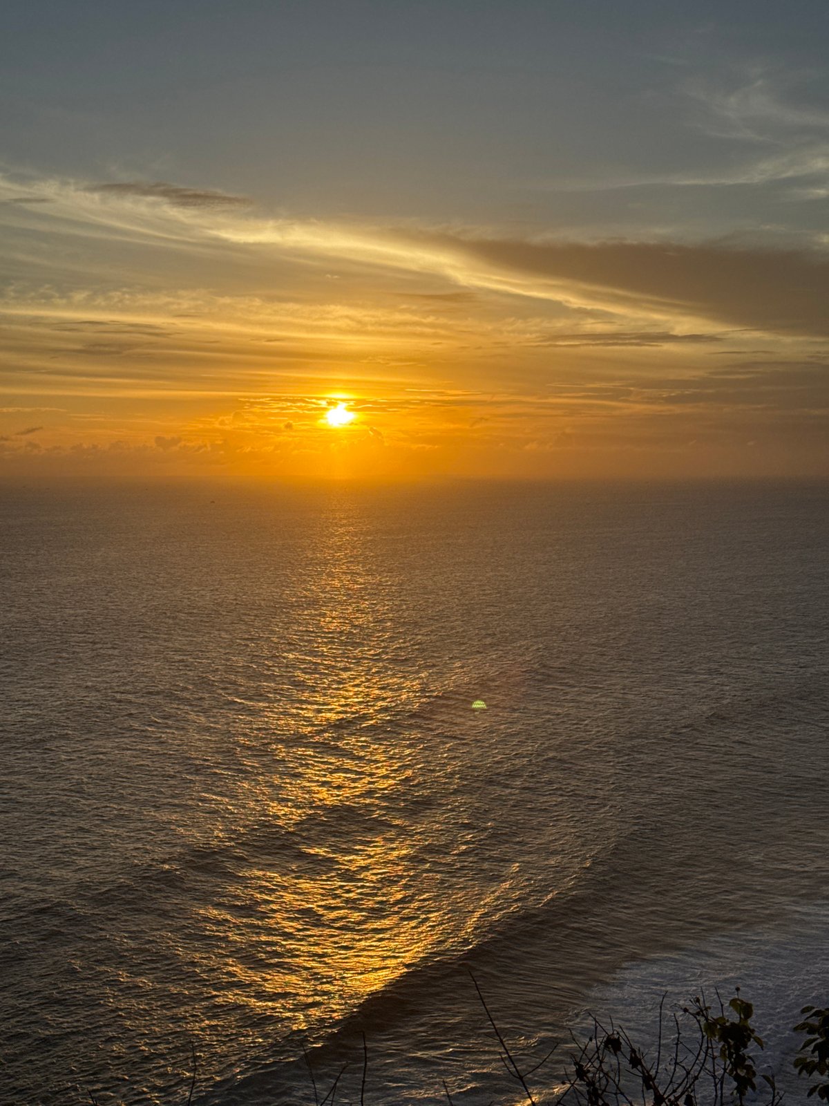 Tropical sunset and motorcycle journey documented across multiple locations