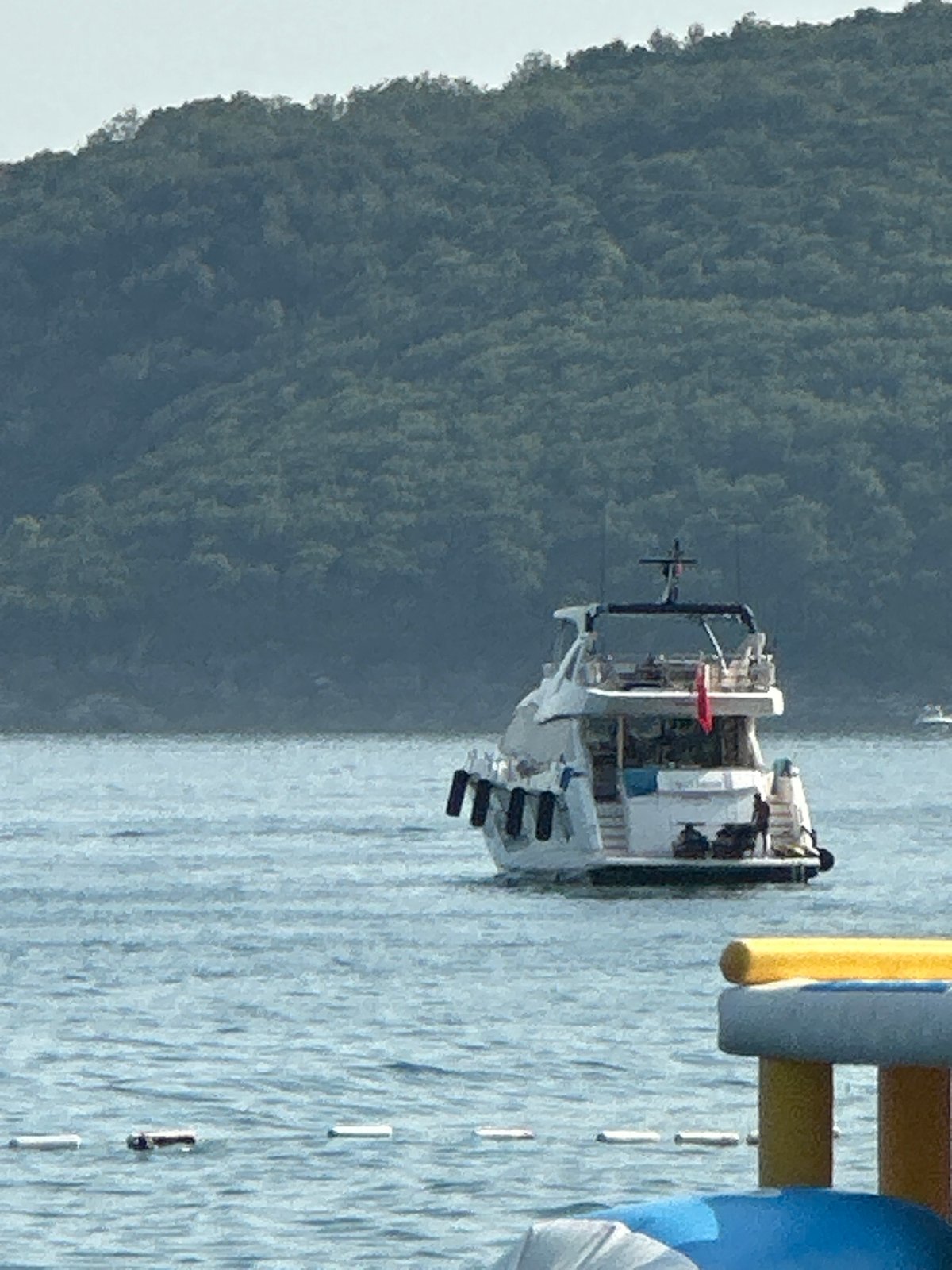 Yachts and speedboats on calm water near Boreti, Montenegro