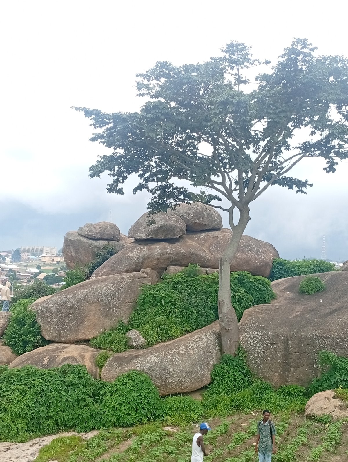 Afternoon at a rocky Jos hilltop with city views