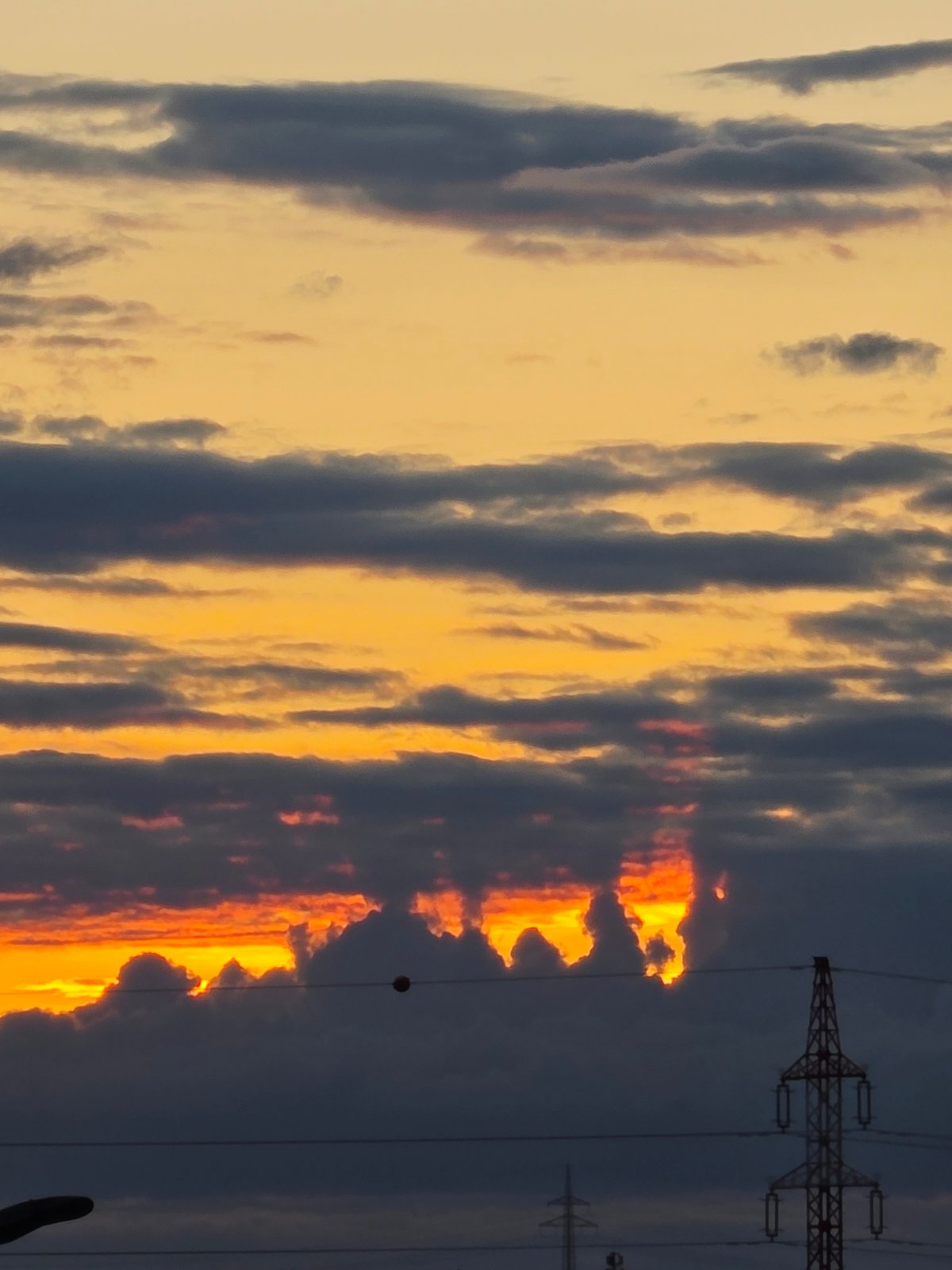 Dramatic sunset lights up Prague sky with fiery colors