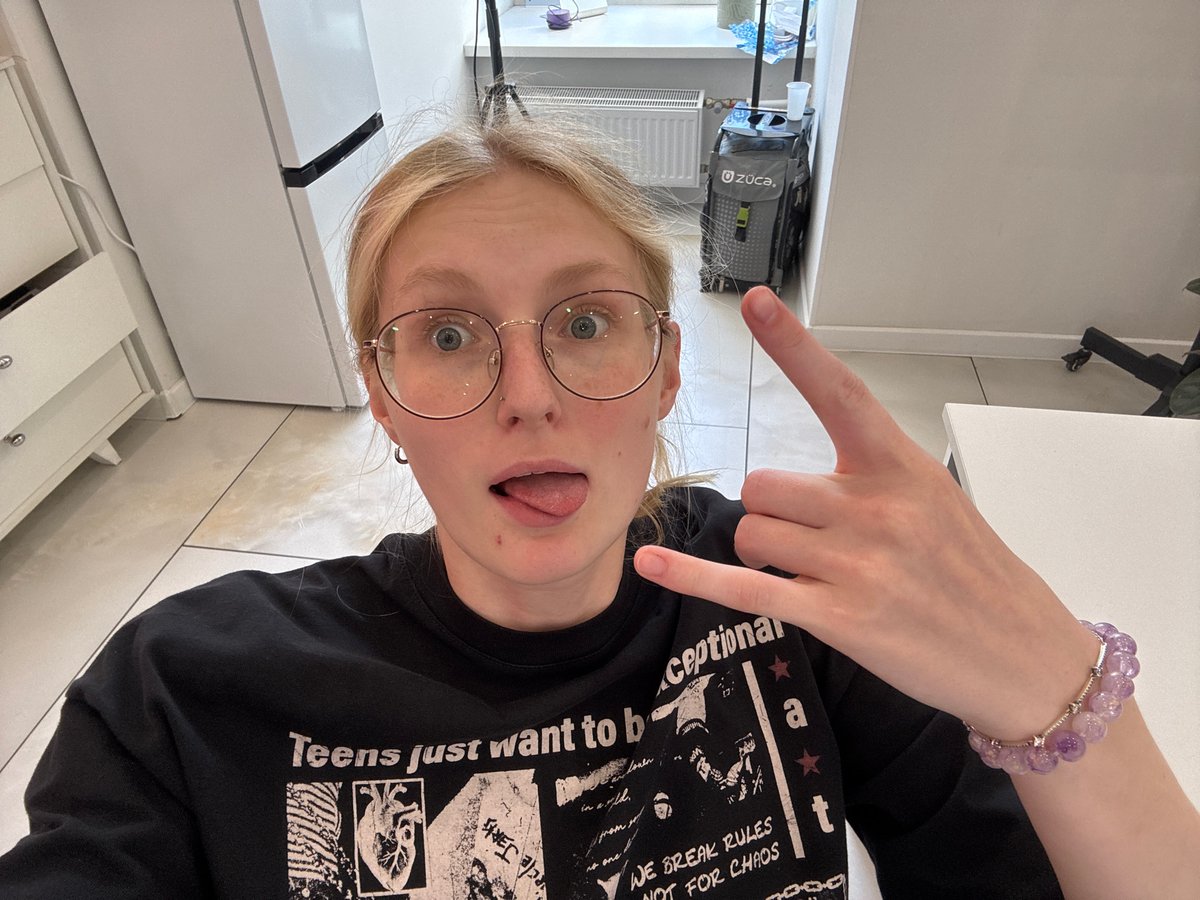 Selfies and desk life in a casual indoor setup