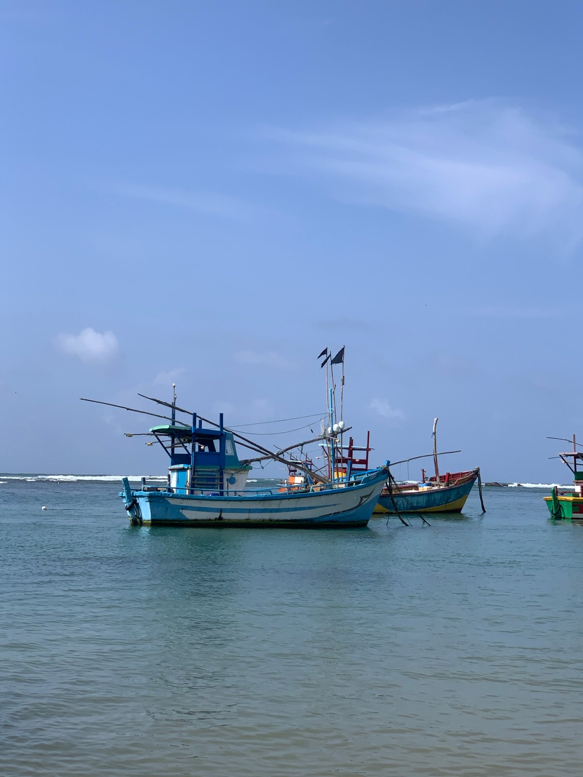 Traditional fishing fleet at rest along Sri Lanka's southern coast