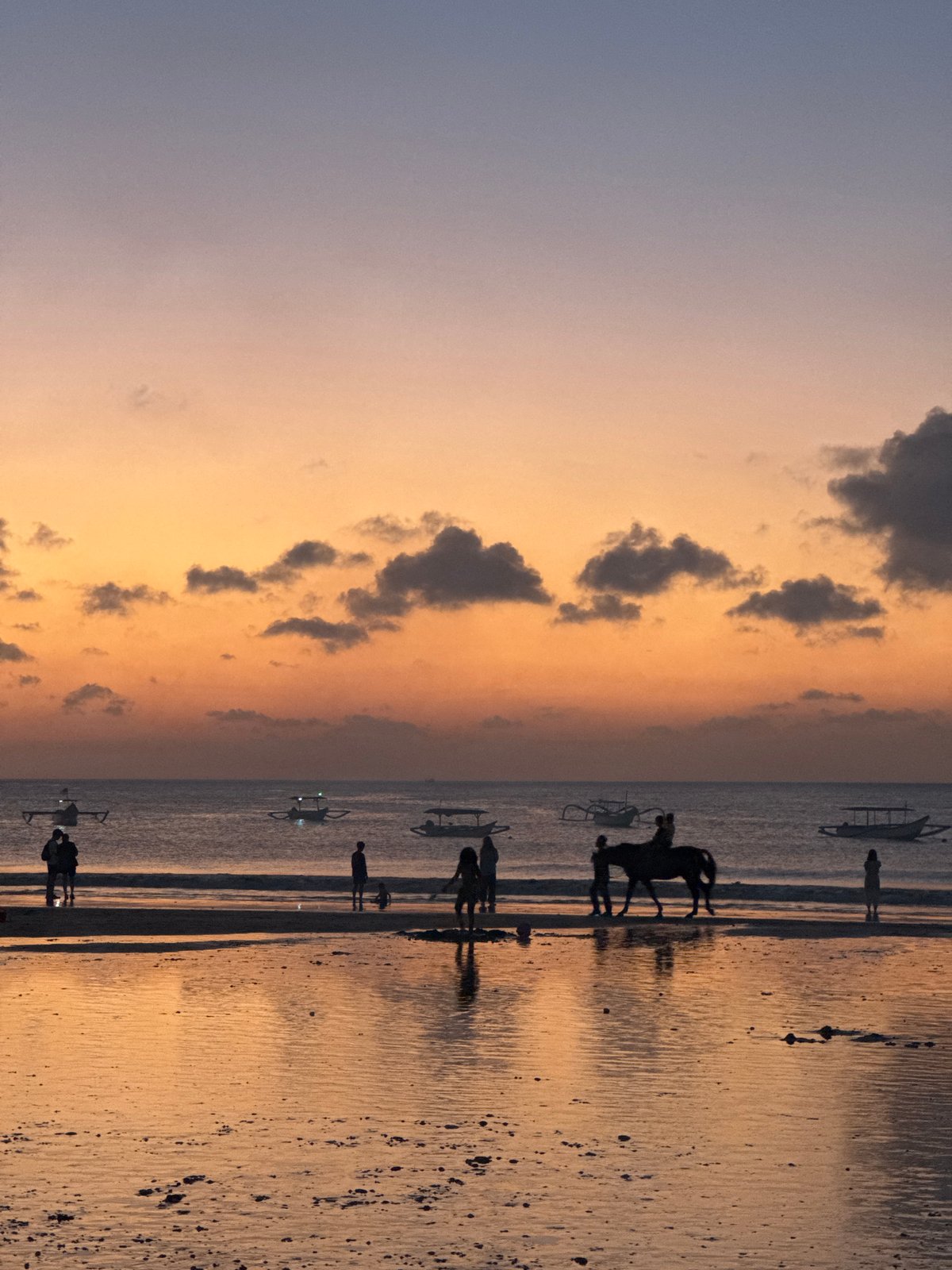 Kuta Beach at golden hour into night, Bali