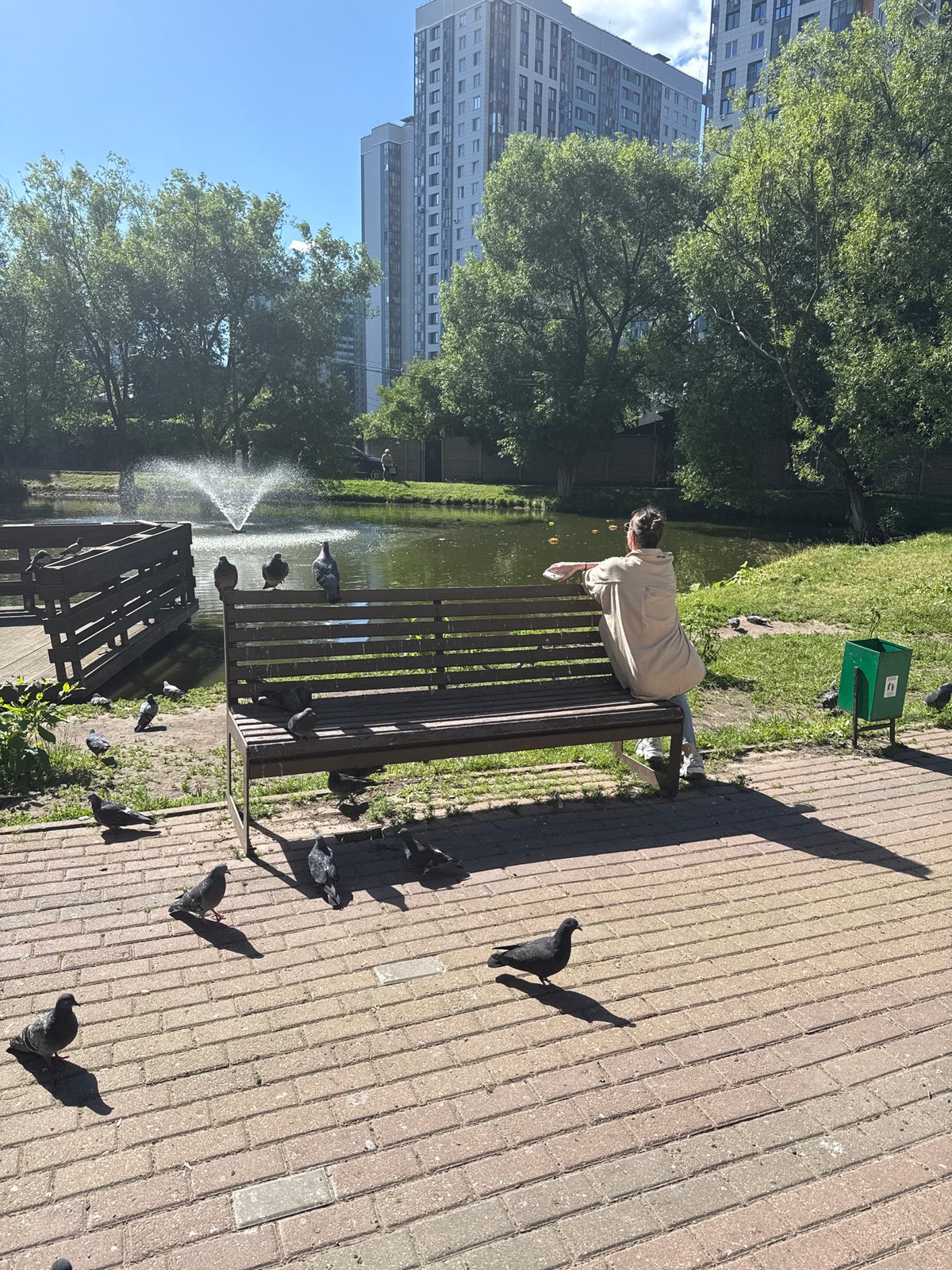 Lazy summer afternoon at a Krasnogorsk park and pond