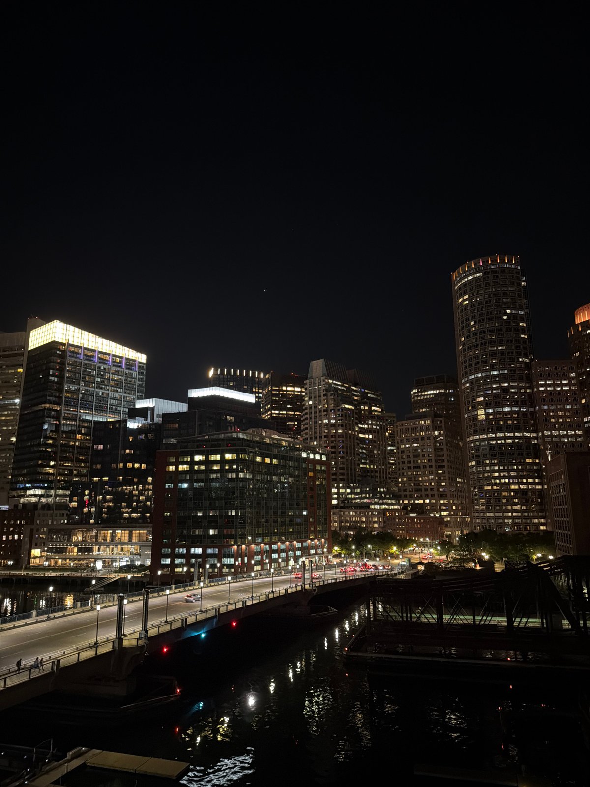 Nighttime Boston skyline captured from elevated vantage point