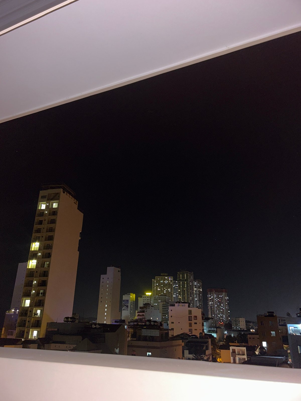 Nighttime cityscape documented from elevated view in Bắc Nha Trang