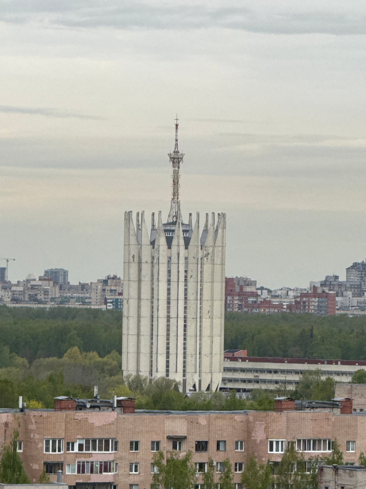 Distinctive white layered building observed in Russian cityscape