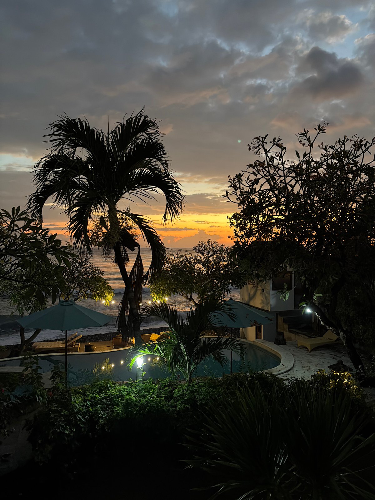 Sunset evening at a coastal resort in Abang, Bali