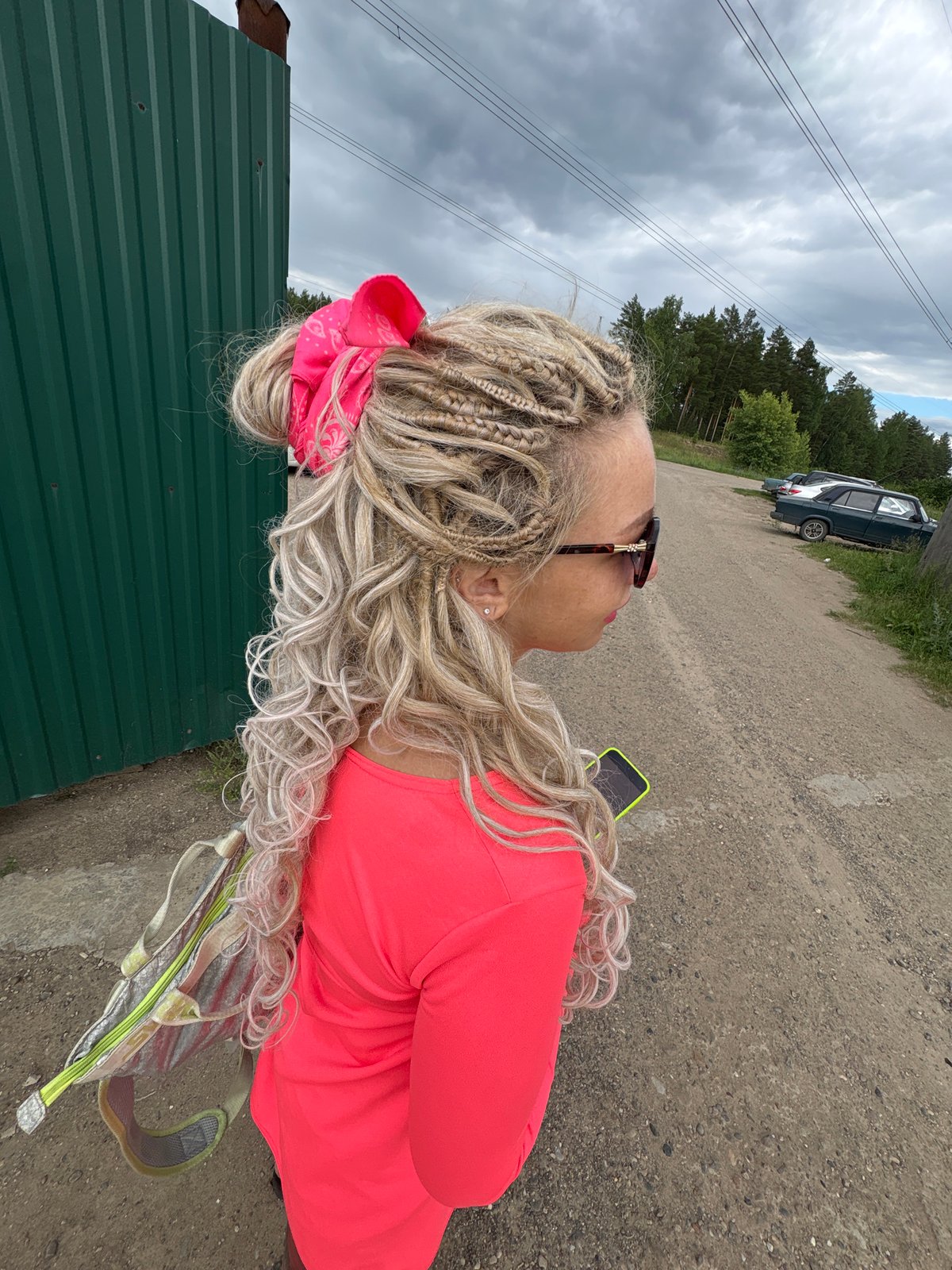 Rural road outing near a Chaykovsky sign in Noviy, Russia