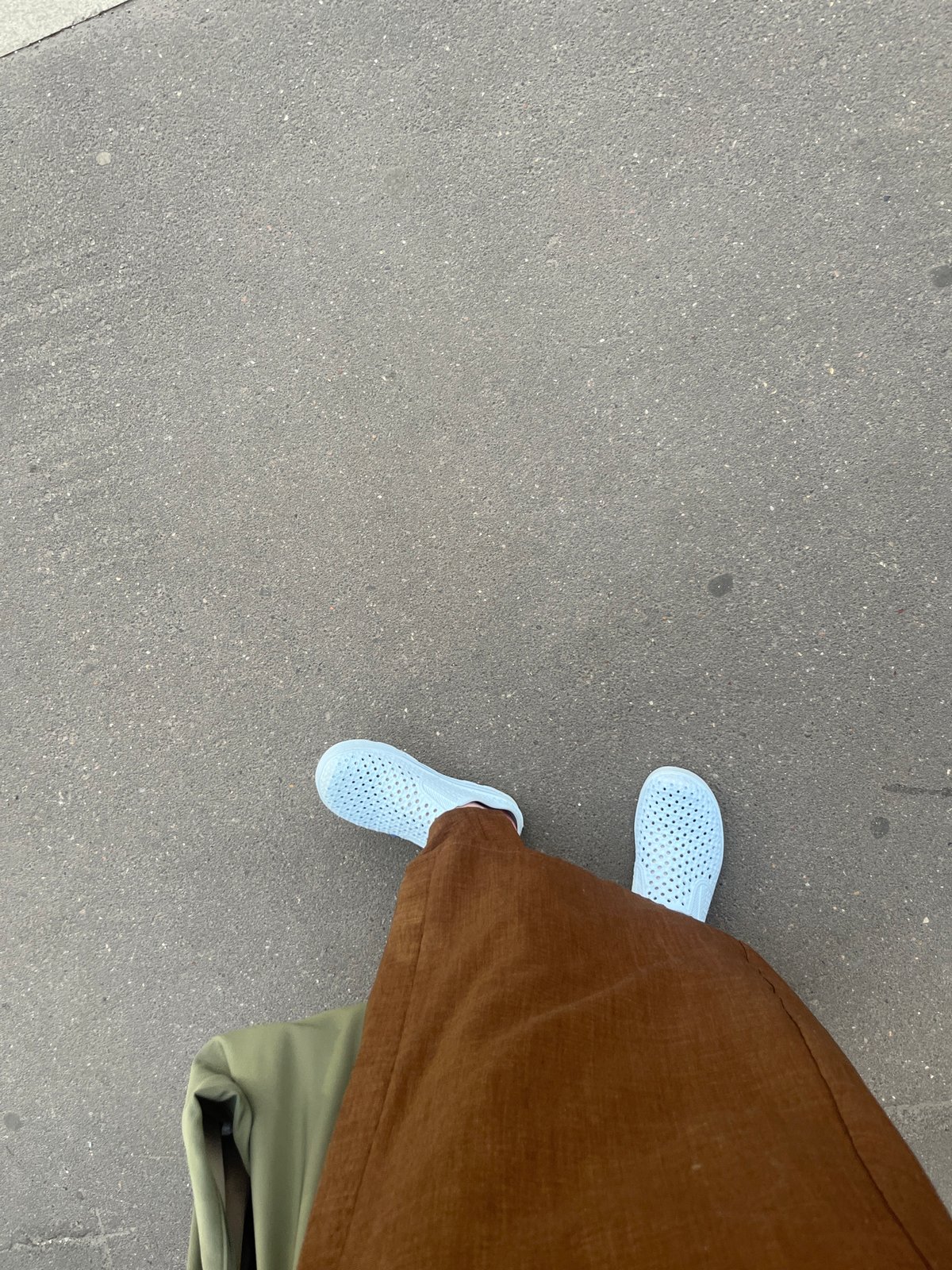 Routine pedestrian and scooter traffic observed on Moscow sidewalk