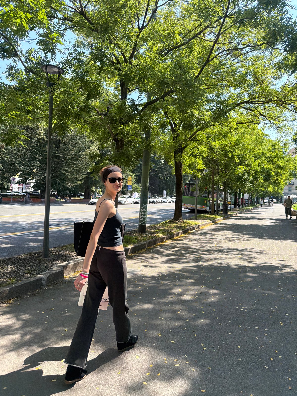 Morning street life documented across Milan parks and sidewalks