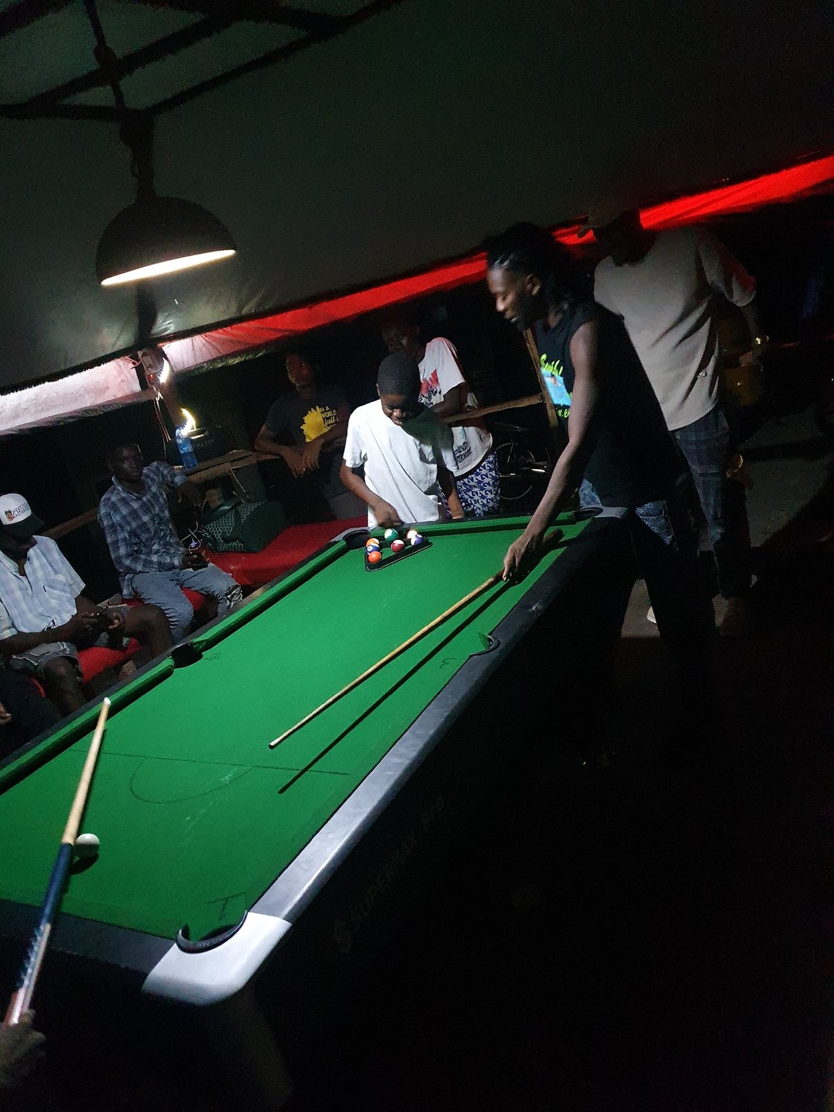 Evening pool game draws crowd in Lokoja recreational venue