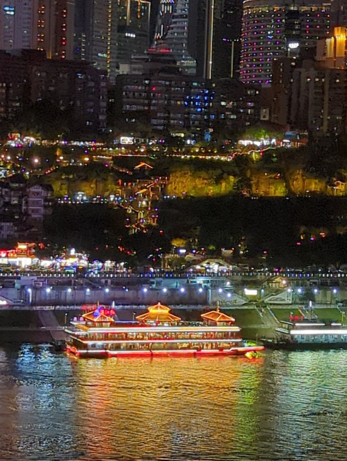 Chongqing's glittering riverfront skyline at night, multiple angles