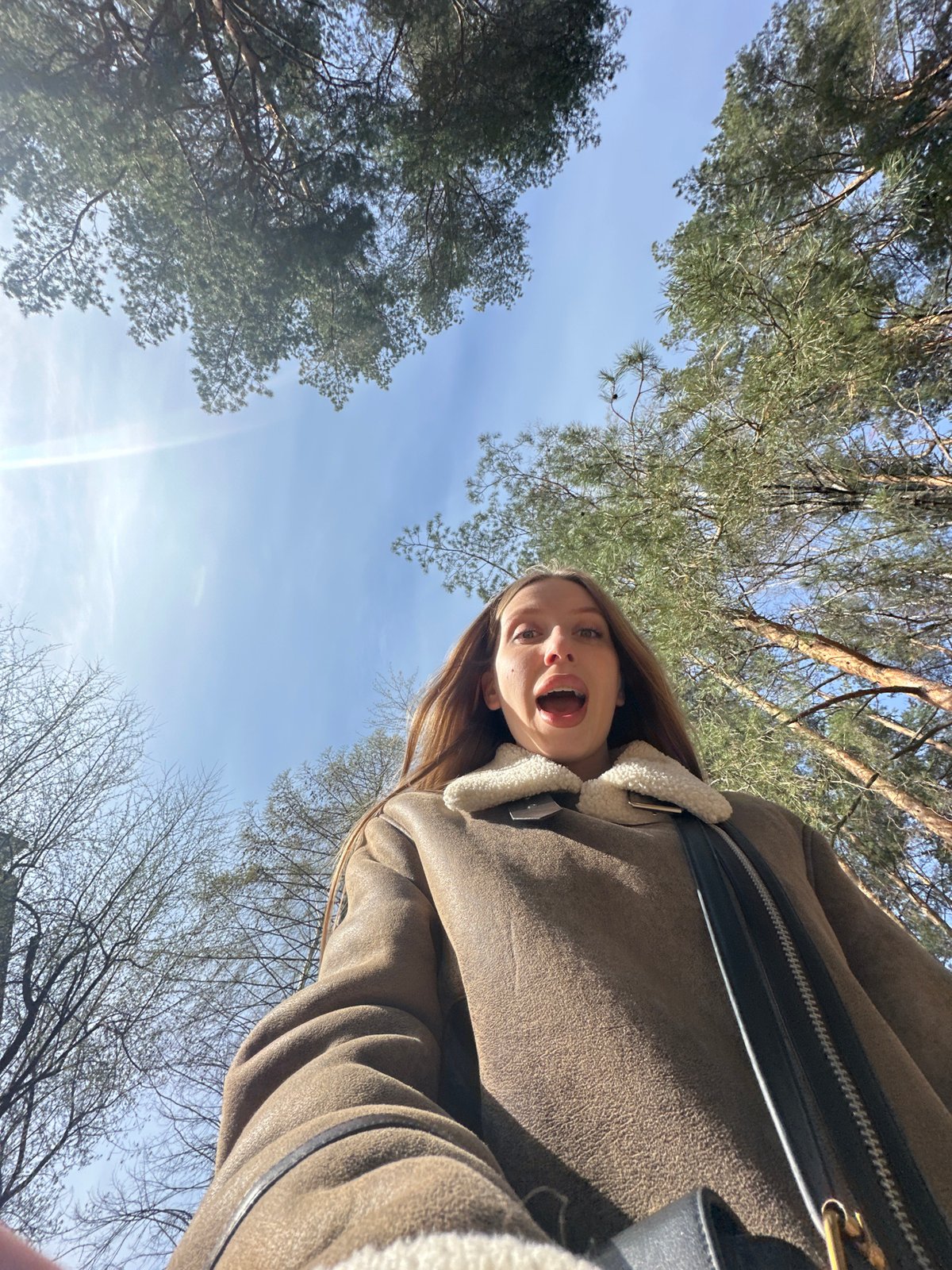 Woman photographed in casual moments in Chaikovsky forest