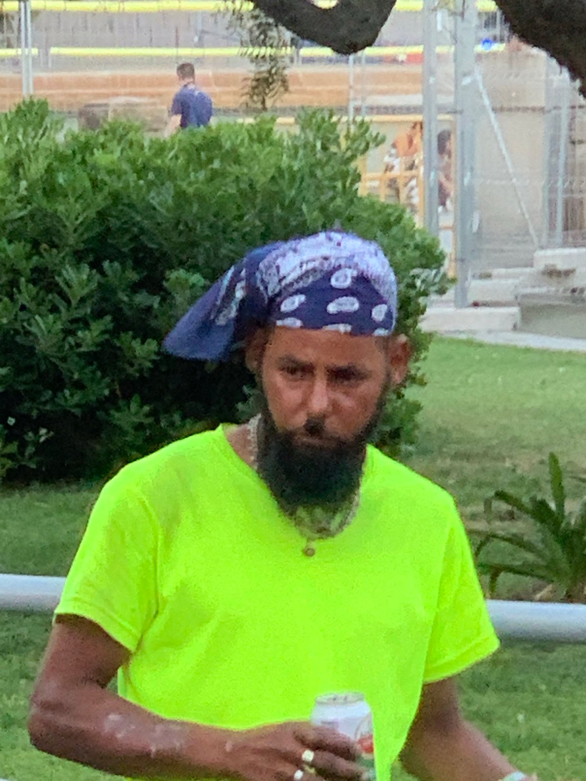 Man in green shirt spotted across Barcelona locations