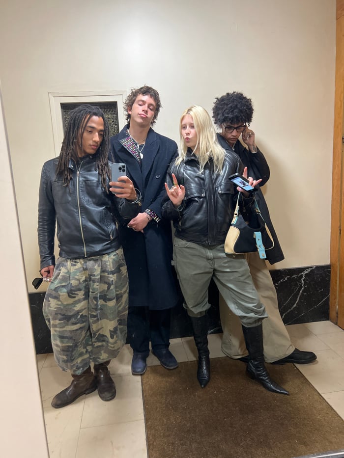 Friends pose for mirror selfies during Paris gathering