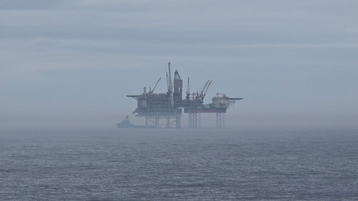 Oil platform operates under heavy fog off Norwegian coast
