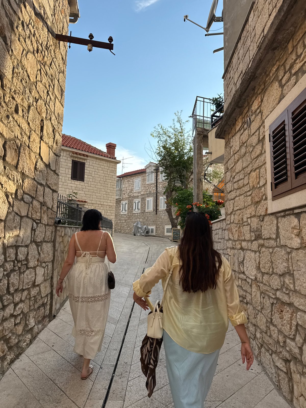 Afternoon wander through Primošten's old town, rainbow included