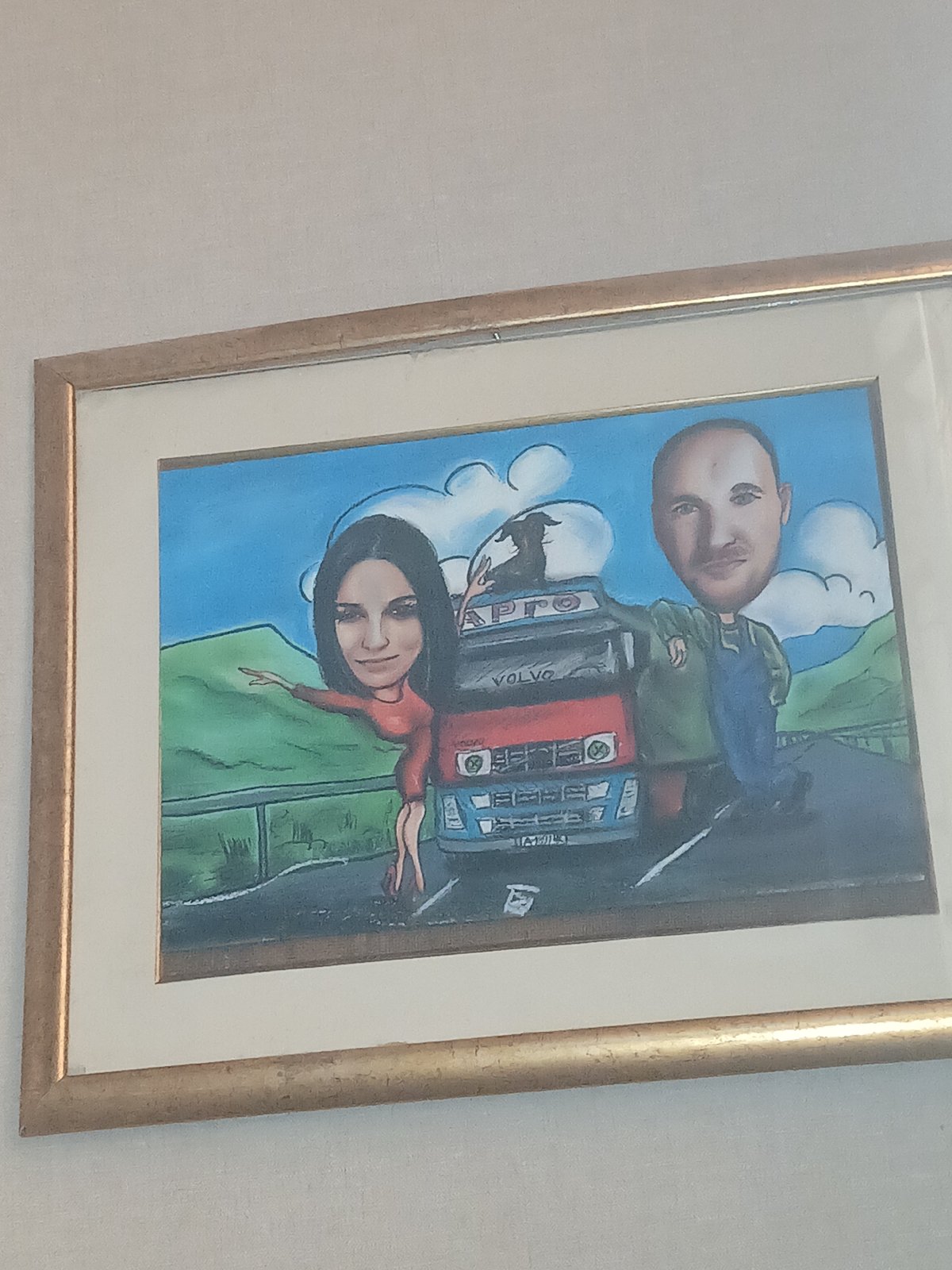 Cartoon painting of couple on Volvo truck displayed in Bulgaria