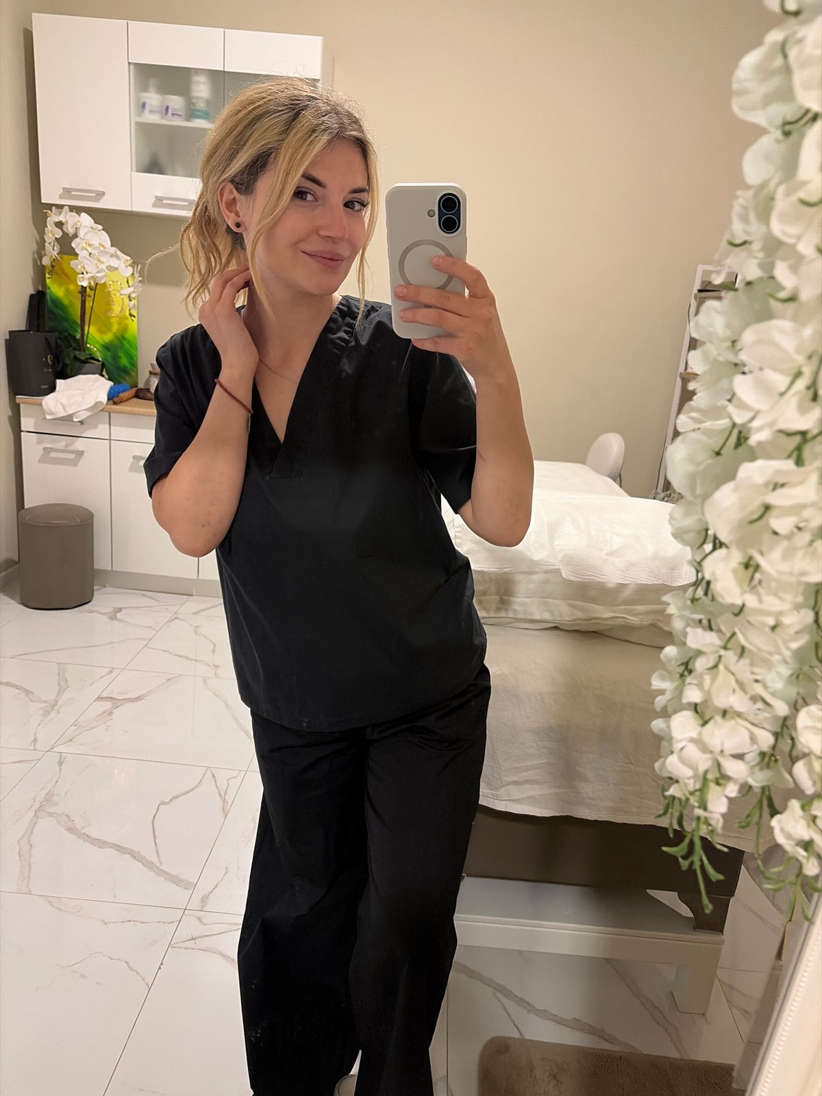 Aesthetic clinic worker documents treatment session in Budva