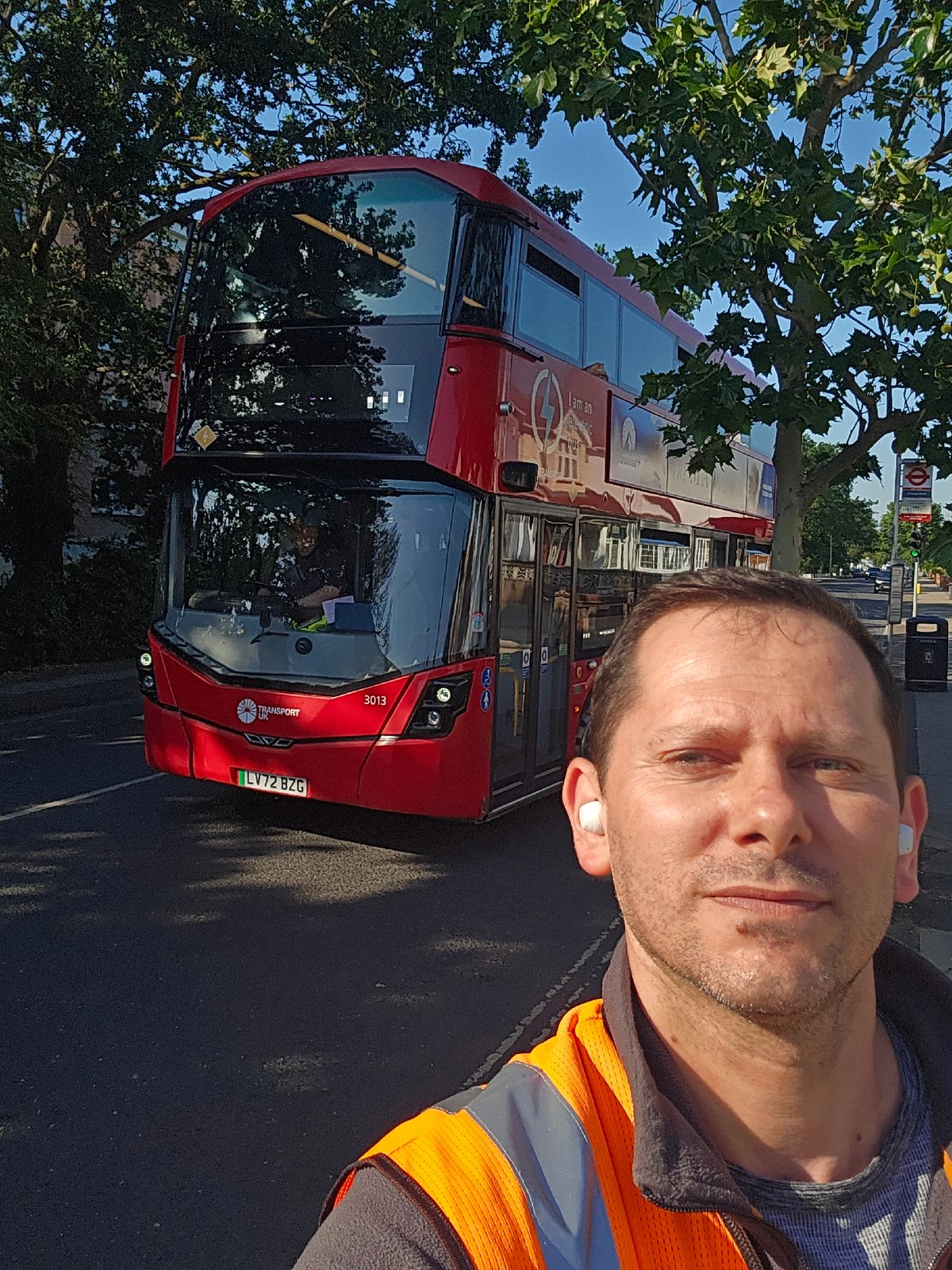 High-vis worker spotted with vehicles in London suburb