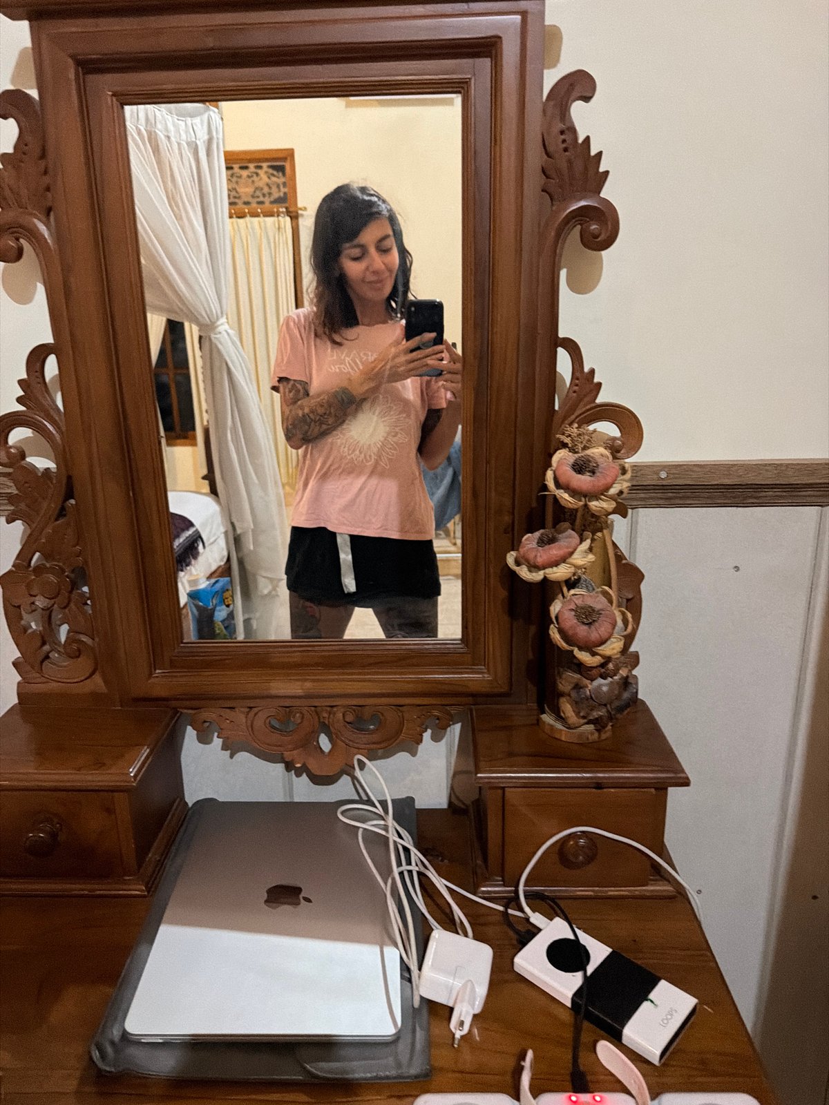 Stone lanterns and a mirror selfie at a Buleleng property