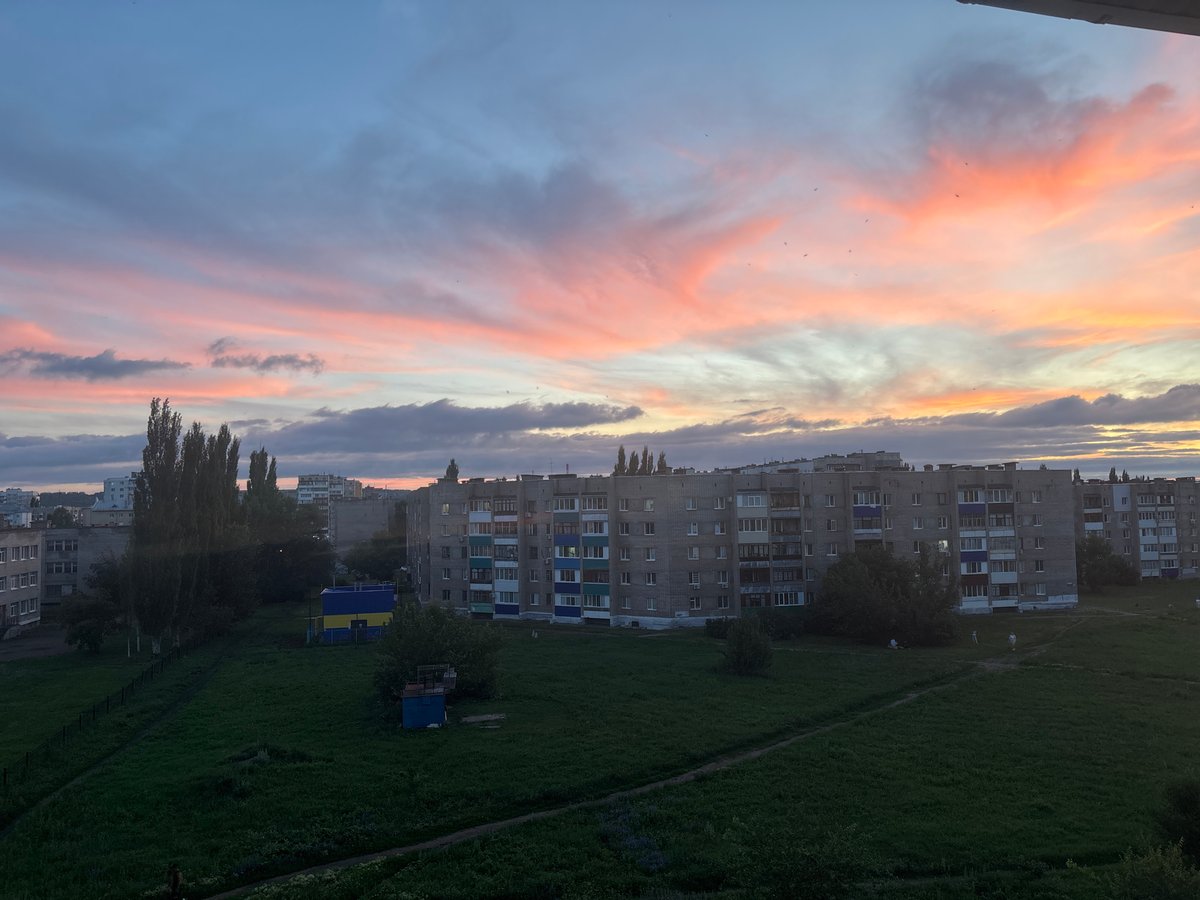 Colorful evening sky settles over Salavat residential streets