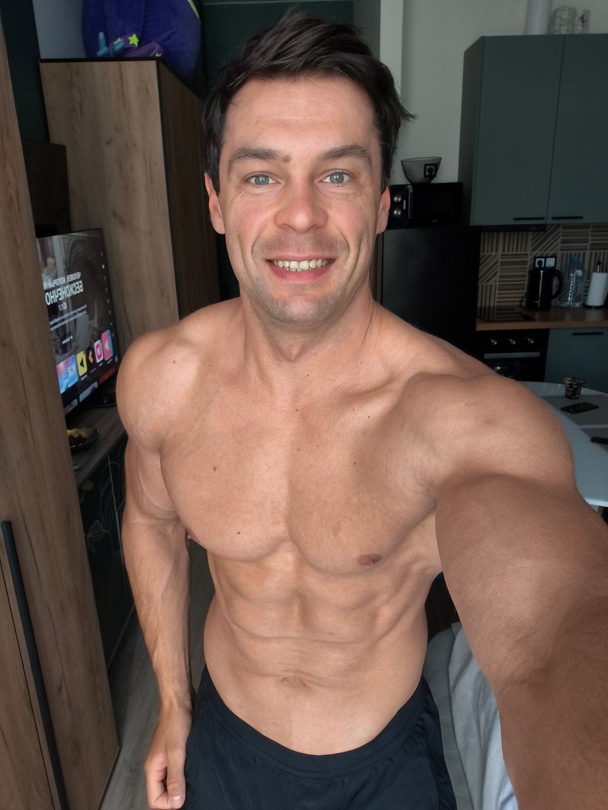 Man Takes Shirtless Selfie in Moscow Morning