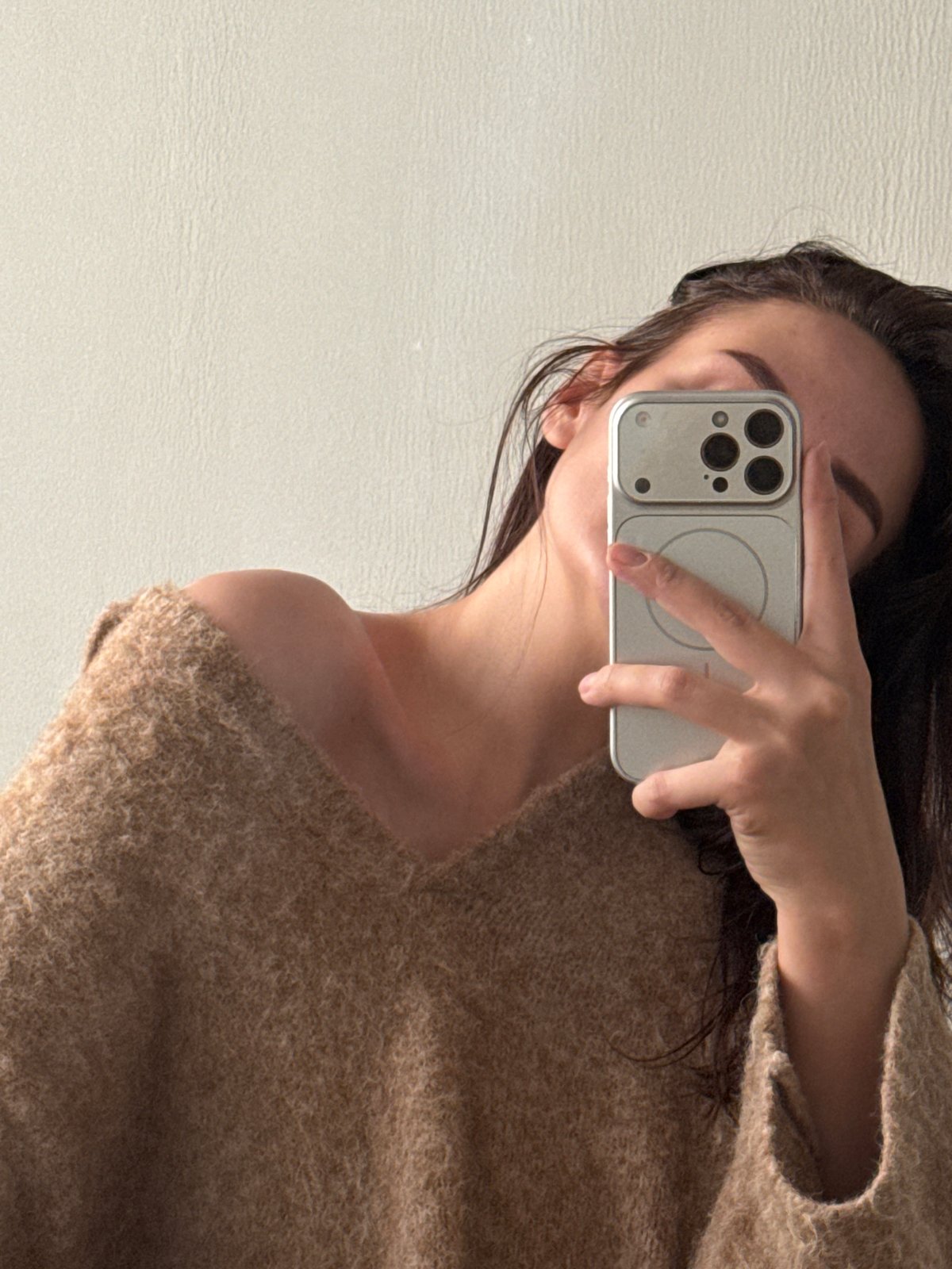 Woman takes mirror selfies during late-night snack in Russia