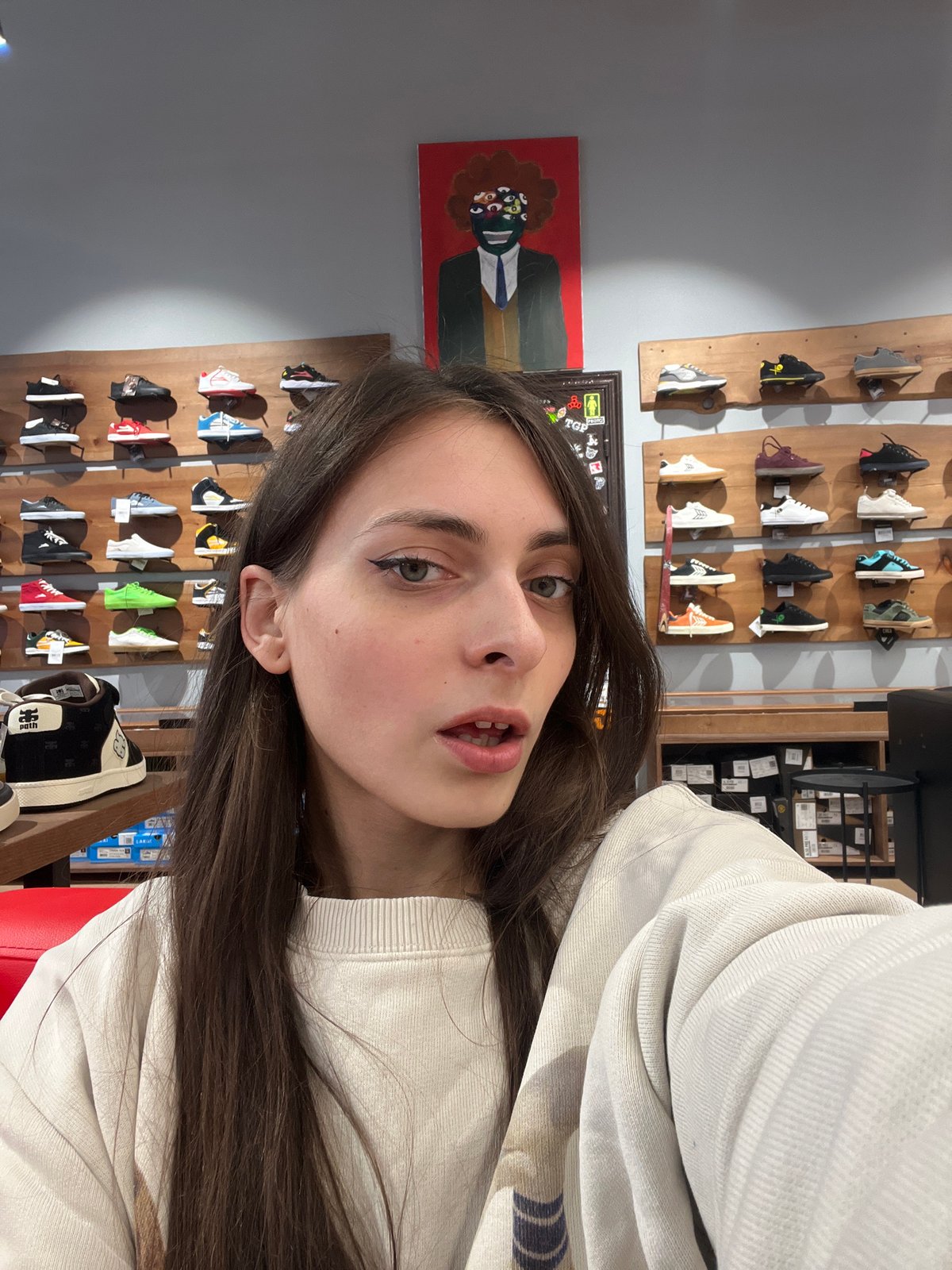 Woman photographed at shoe display in Krasnoyarsk store