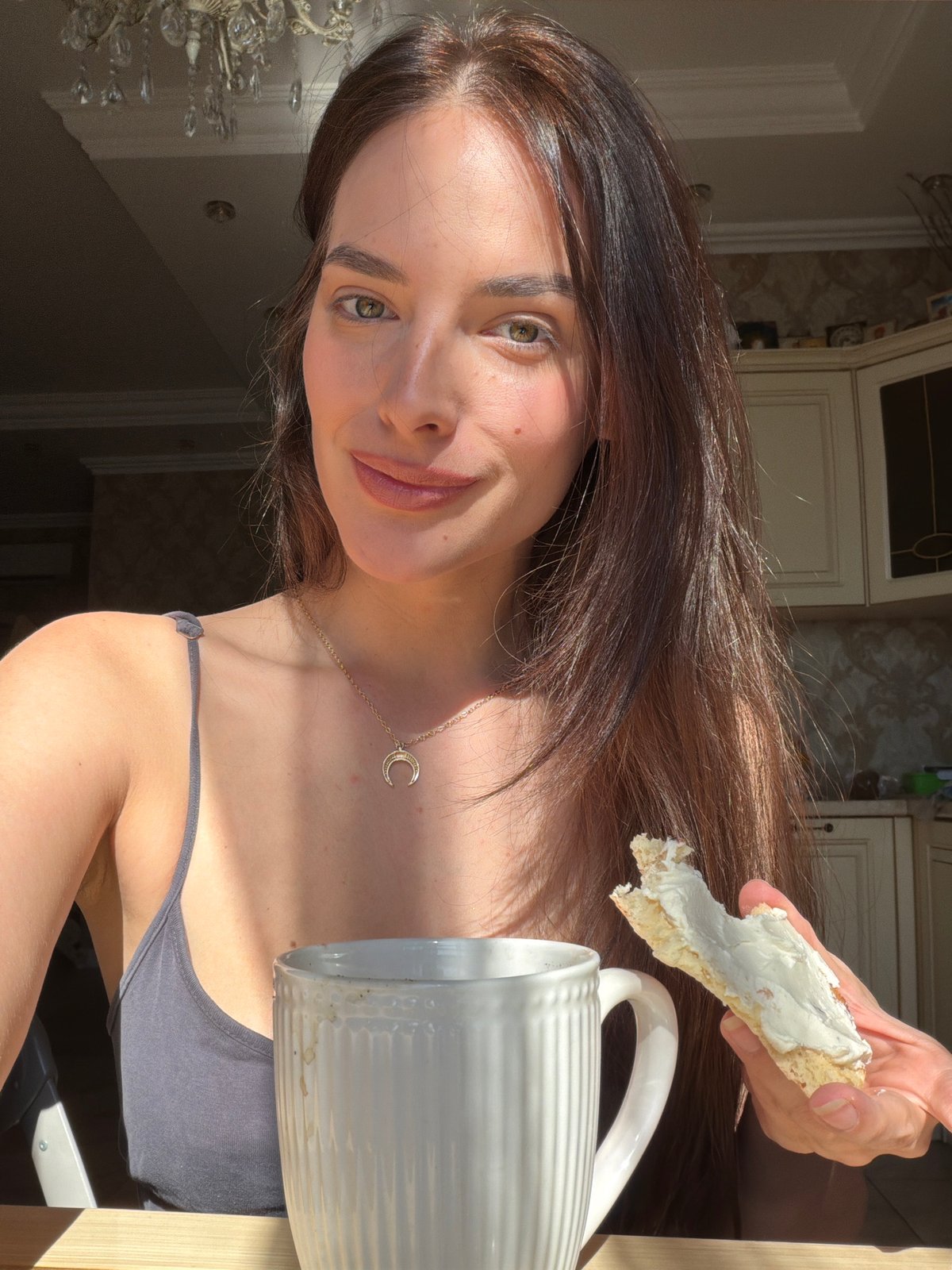 Morning light, a mug, and a quick bite indoors