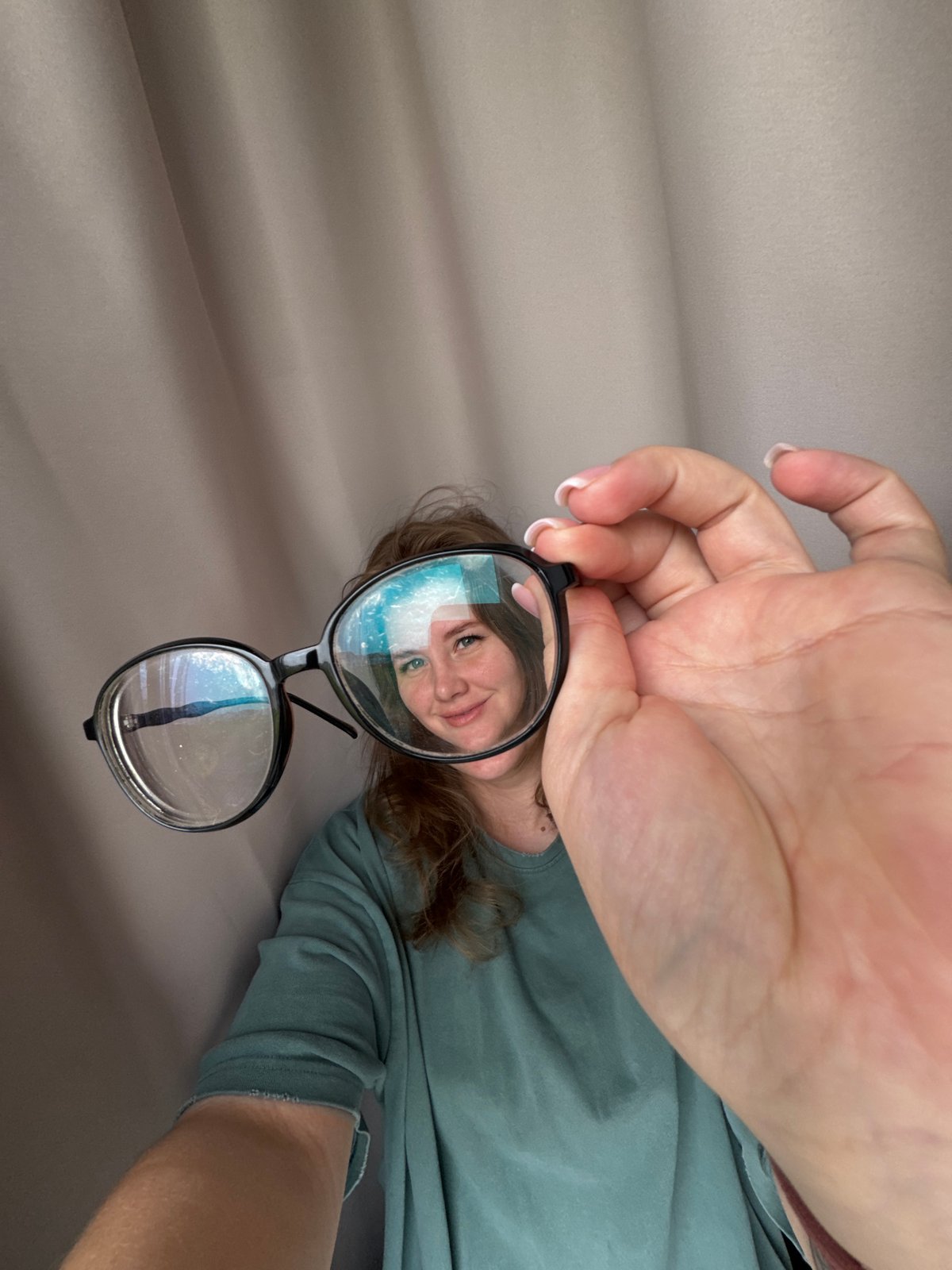 Woman poses with glasses in Ферма, Russia