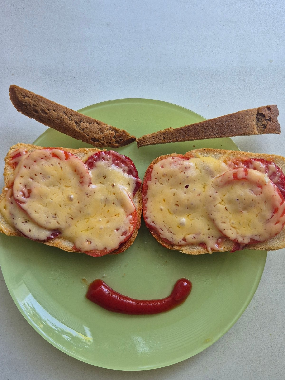 Morning meal documented in Kokshetau features cheese tomato sandwiches