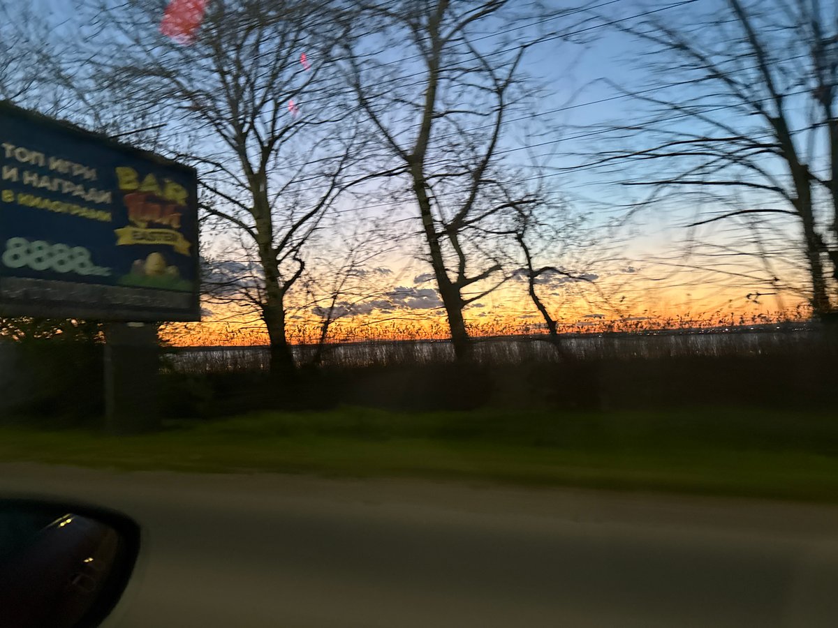 Vehicle passenger captures sunset/sunrise view in Burgas, Bulgaria