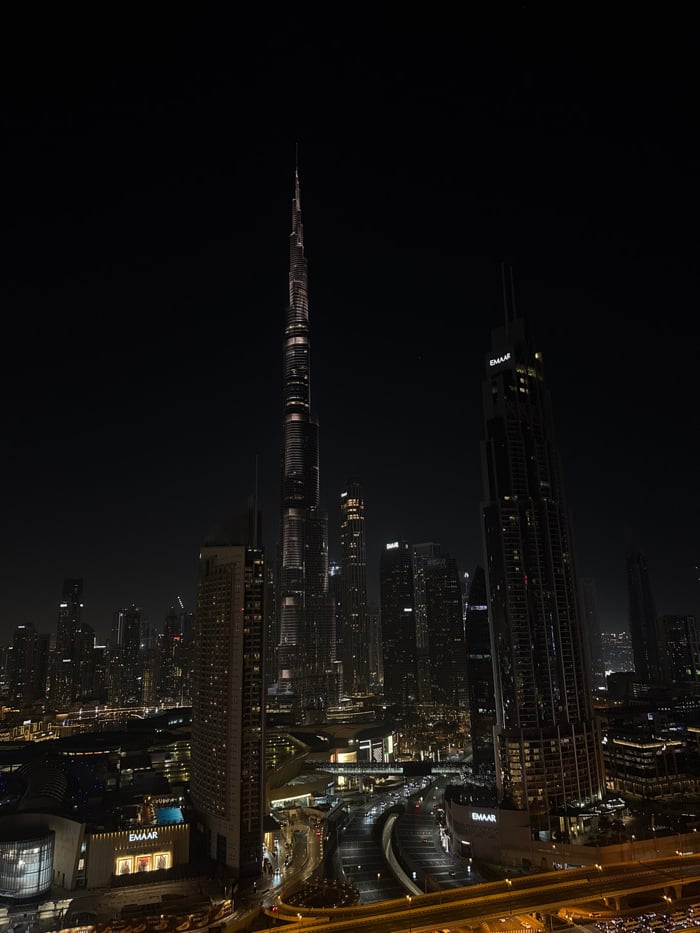 Nighttime Dubai skyline documented from multiple angles