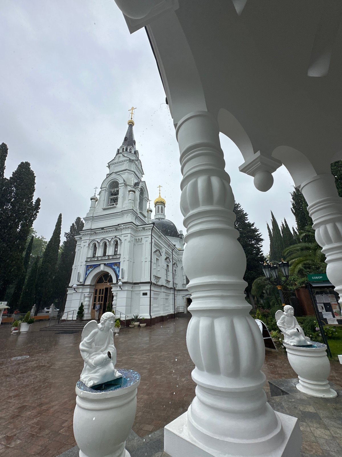 Orthodox church and harbor-side drinks on a Sochi morning