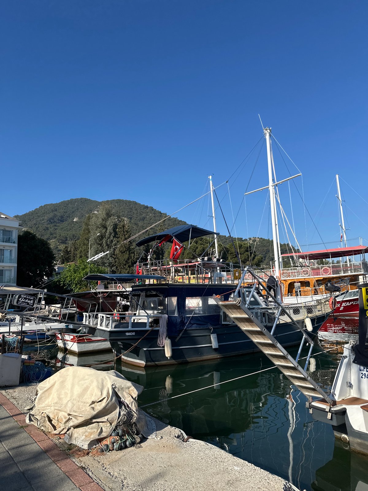 Clear skies over Fethiye marina as boats dock peacefully