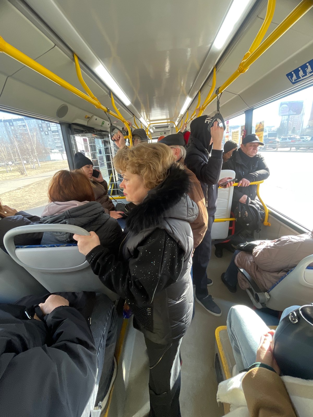 Crowded late-night bus ride documented in Krasnoyarsk, Russia